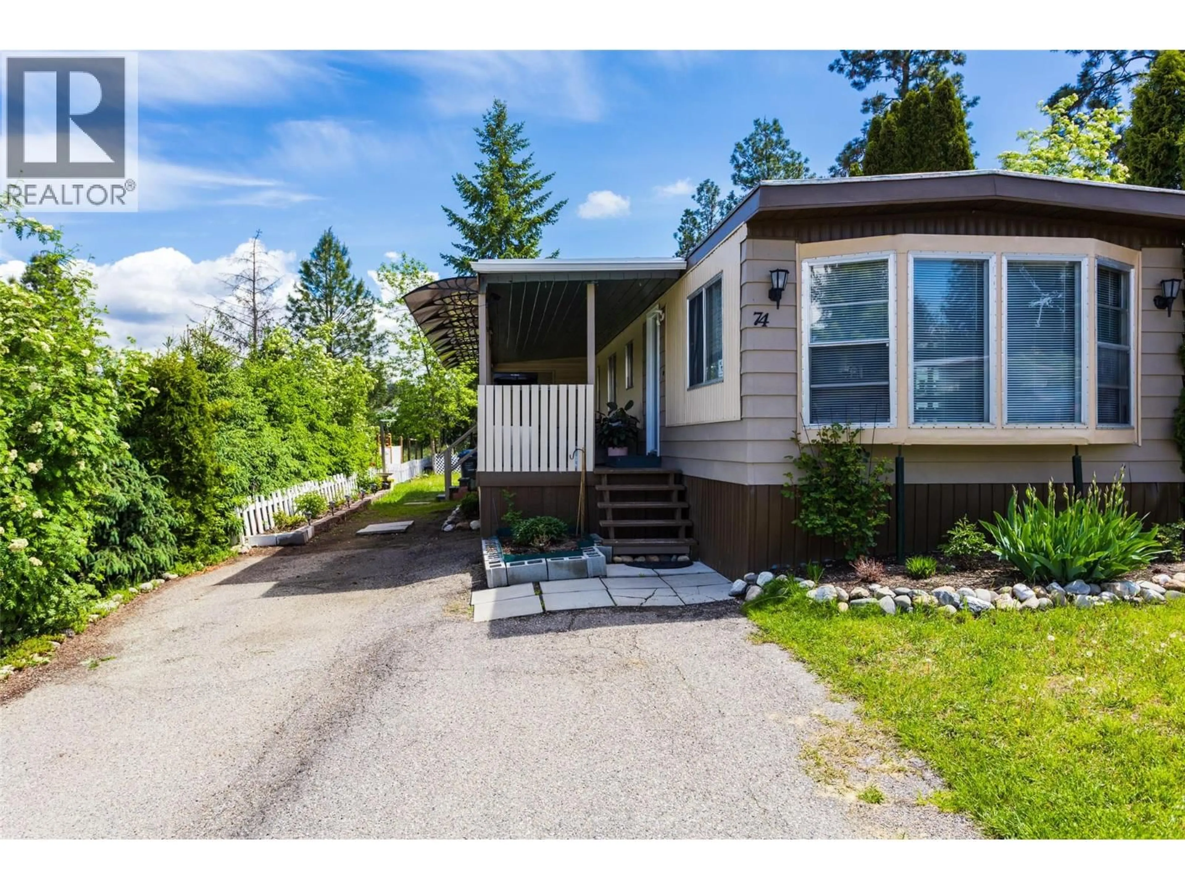 Home with vinyl exterior material, street for 74 - 3535 MCCULLOCH ROAD, Kelowna British Columbia V1W4R6