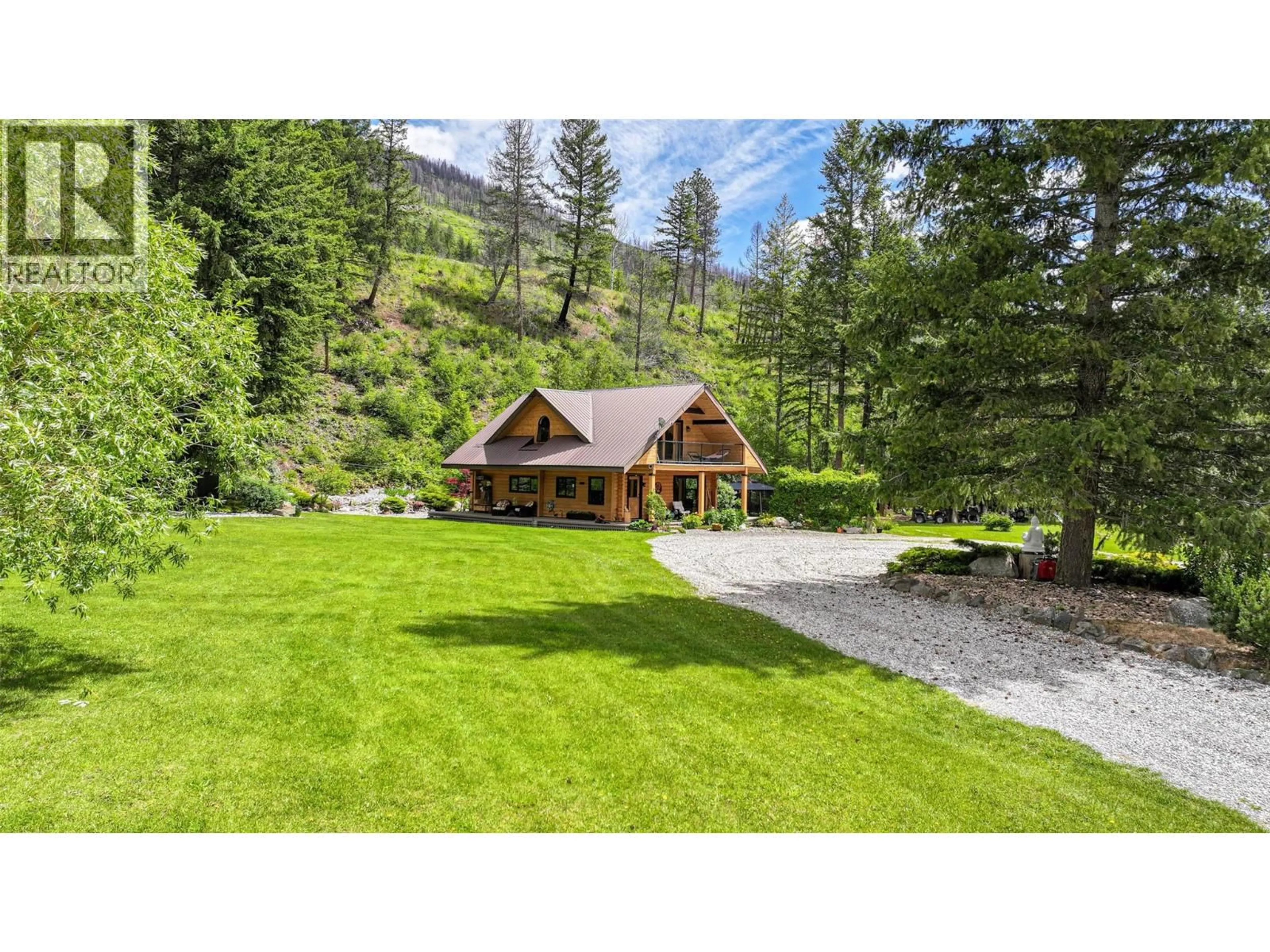 A pic from outside/outdoor area/front of a property/back of a property/a pic from drone, mountain view for 1075 SIX MILE CREEK ROAD, Vernon British Columbia V1H2H1