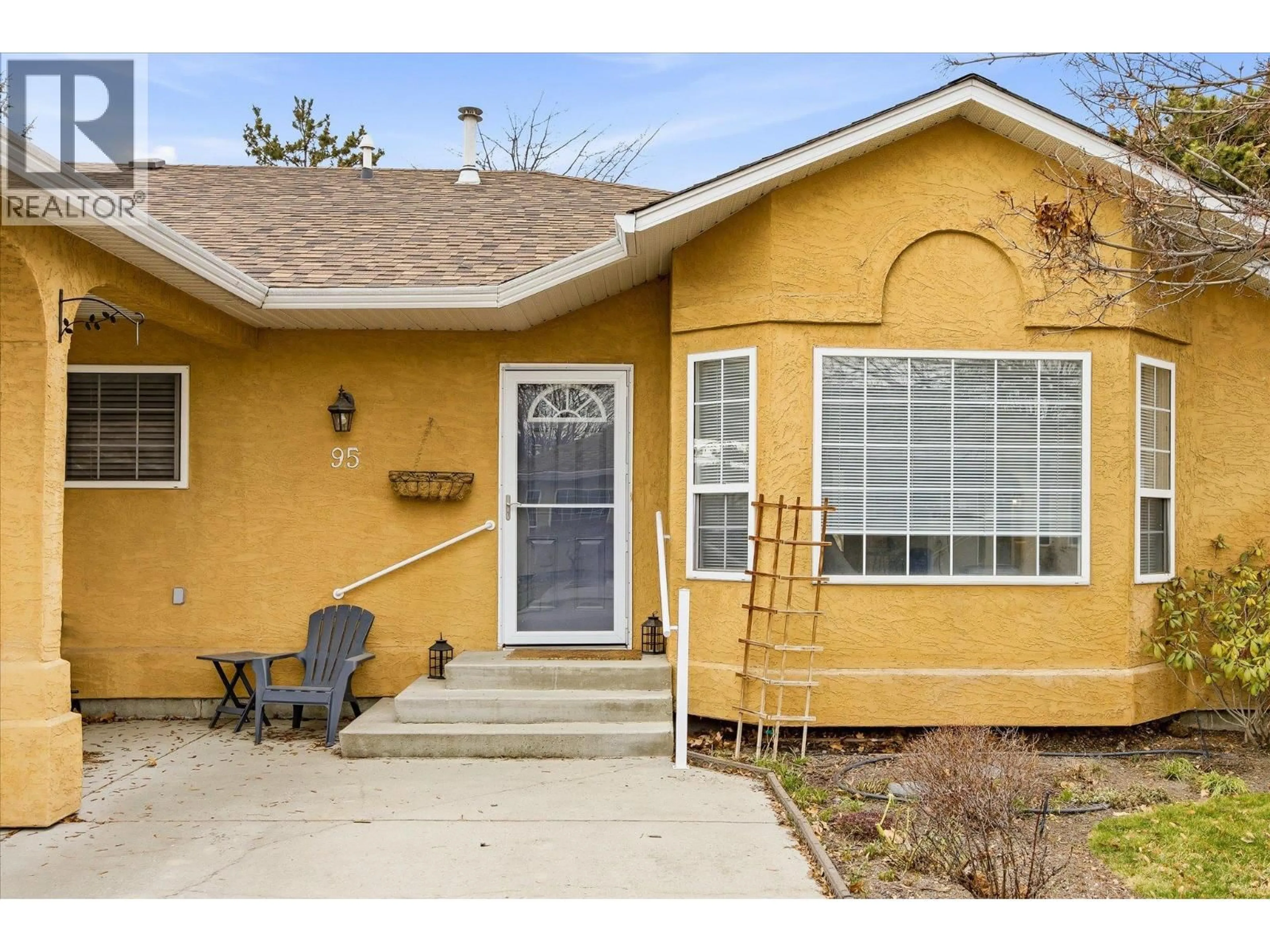 Home with vinyl exterior material, street for 95 - 2210 LOUIE DRIVE, West Kelowna British Columbia V4T2L7