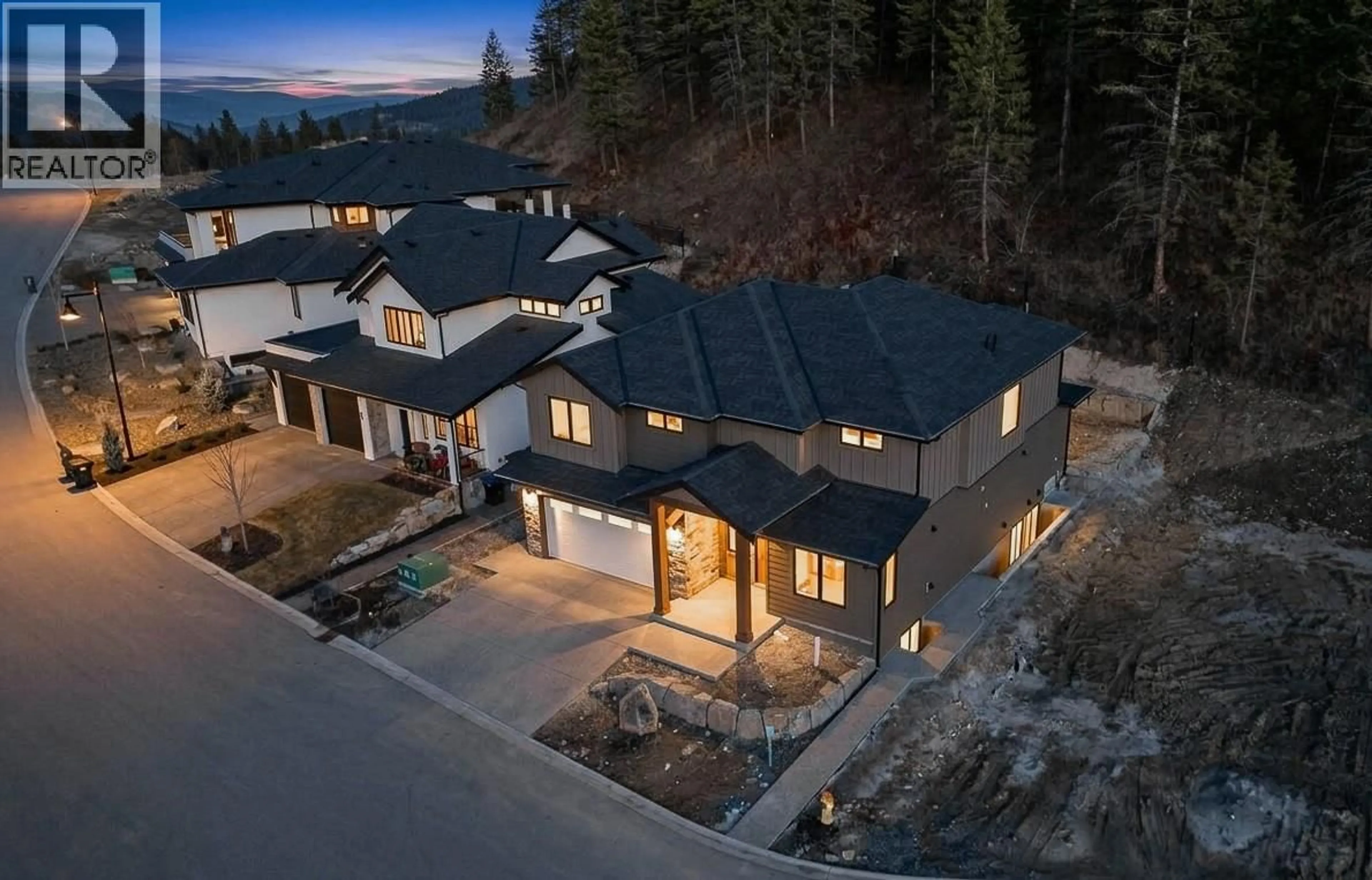 A pic from outside/outdoor area/front of a property/back of a property/a pic from drone, mountain view for 1531 OLIVE POND PLACE, Kelowna British Columbia V1V2C6