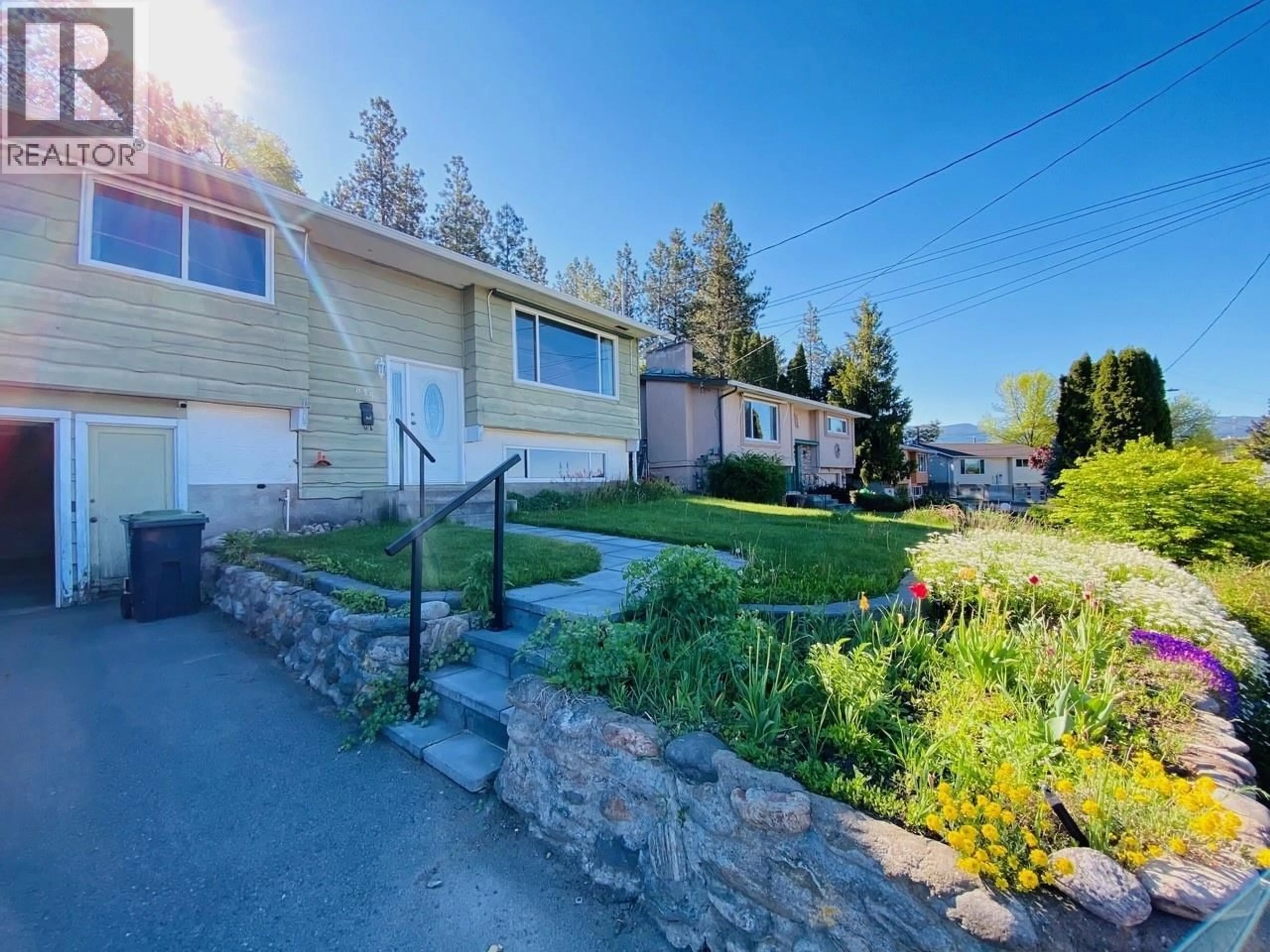 A pic from outside/outdoor area/front of a property/back of a property/a pic from drone, street for 835 CAMELIA ROAD, Kelowna British Columbia V1X3M9