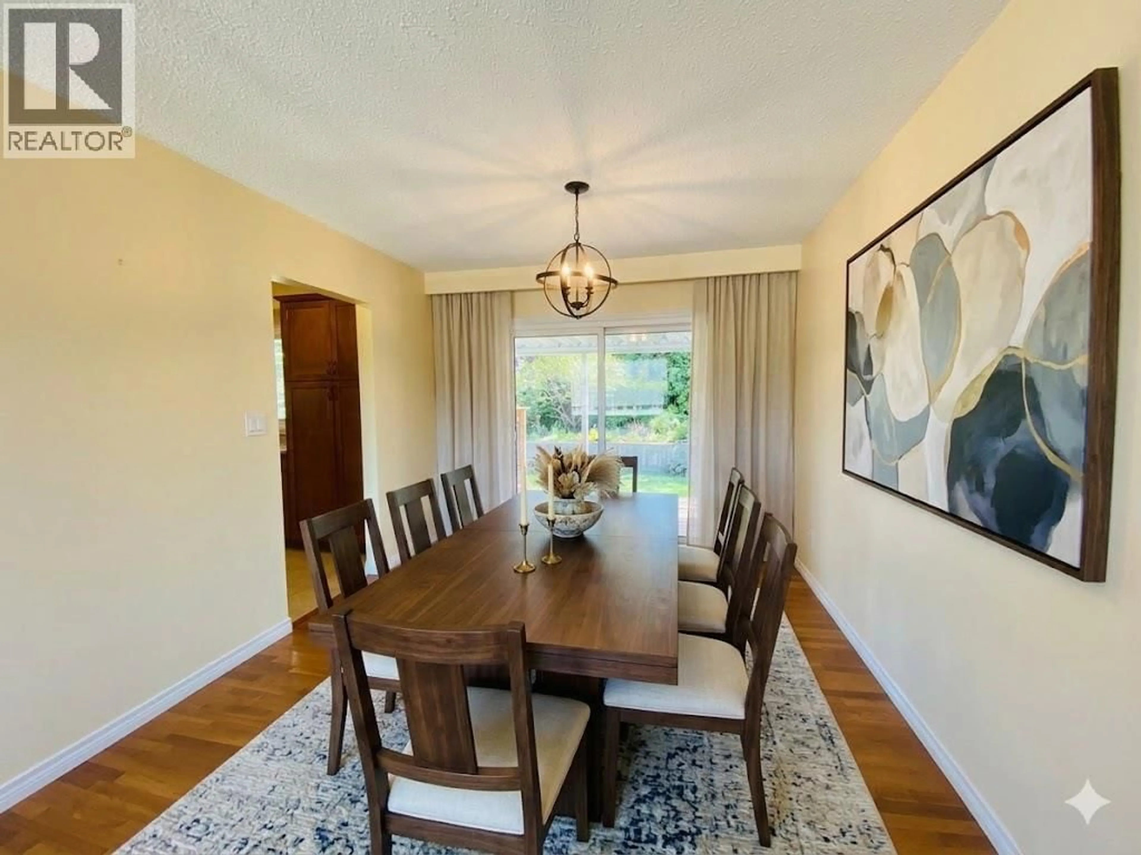 Dining room, wood/laminate floor for 835 CAMELIA ROAD, Kelowna British Columbia V1X3M9