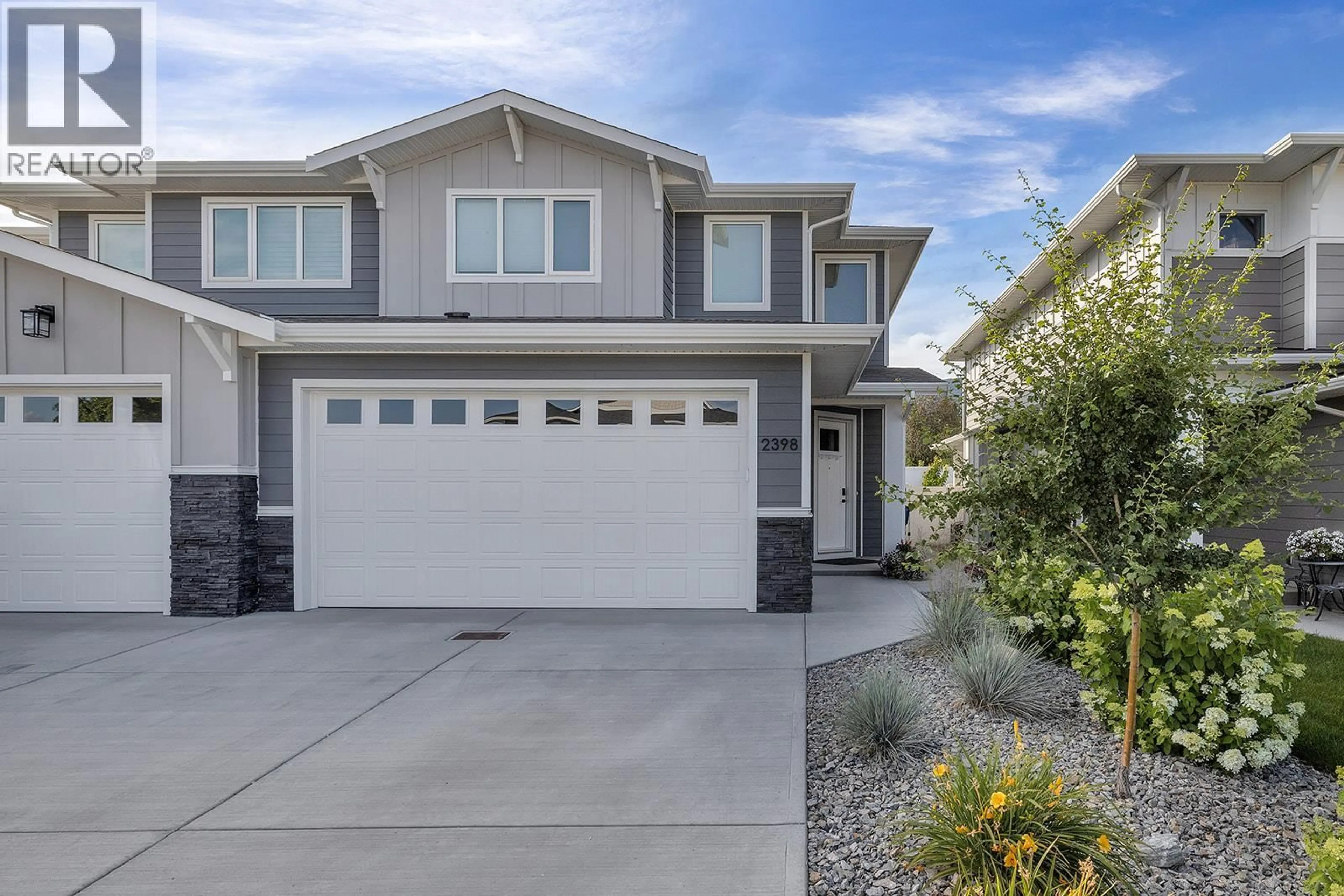 Home with vinyl exterior material, street for 2398 HAWKS BOULEVARD, West Kelowna British Columbia V4T0A7