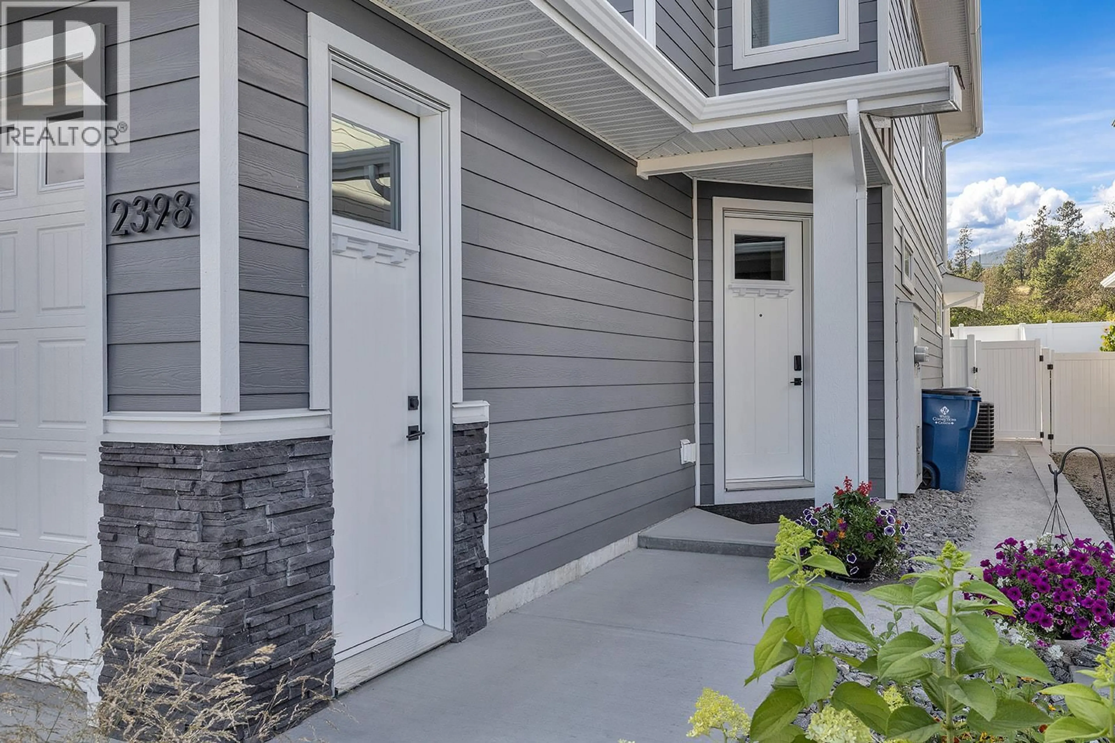 Home with vinyl exterior material, street for 2398 HAWKS BOULEVARD, West Kelowna British Columbia V4T0A7