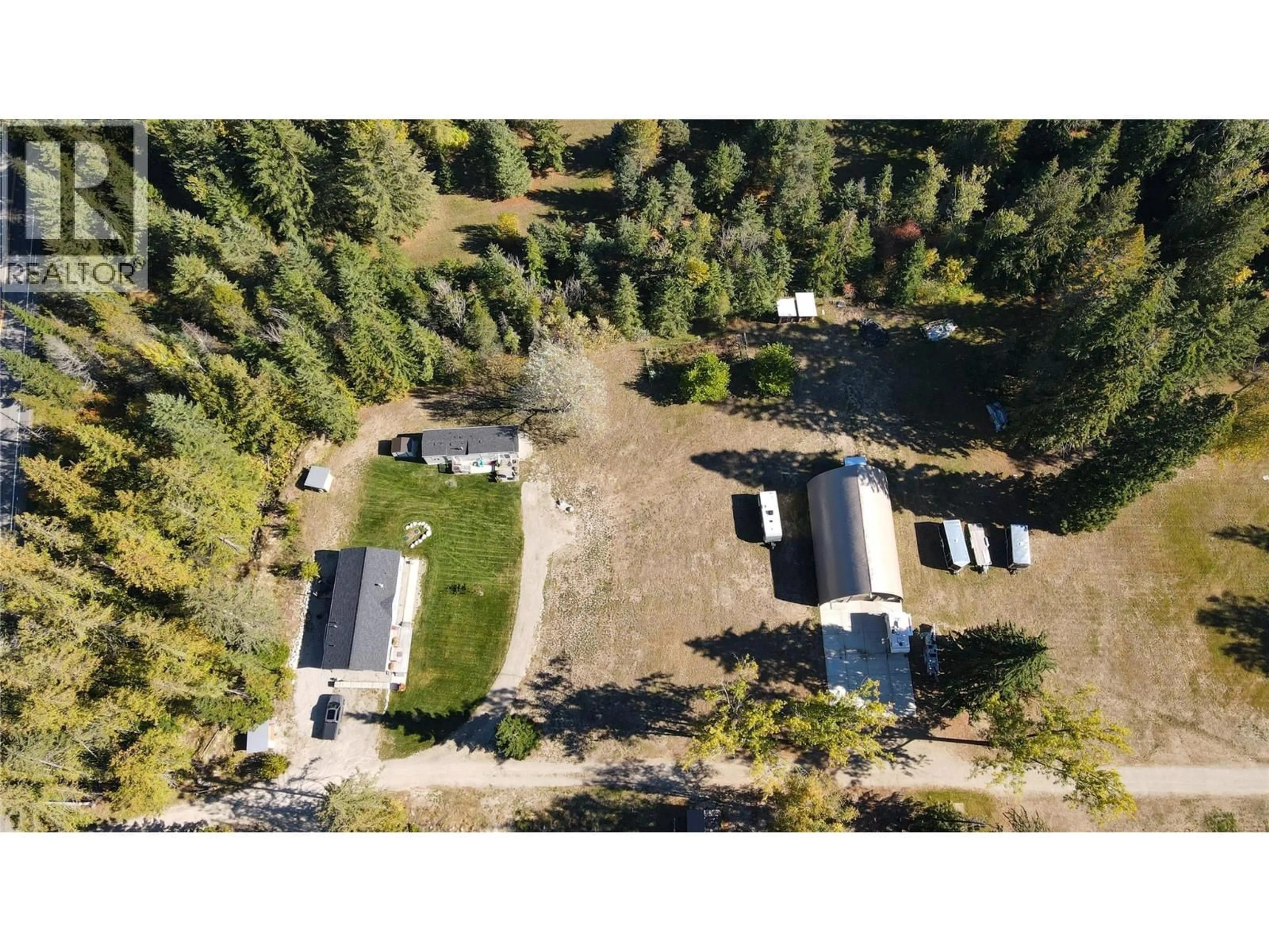 A pic from outside/outdoor area/front of a property/back of a property/a pic from drone, forest/trees view for 6142 HIGHWAY 3A HIGHWAY, Nelson British Columbia V1L6P5