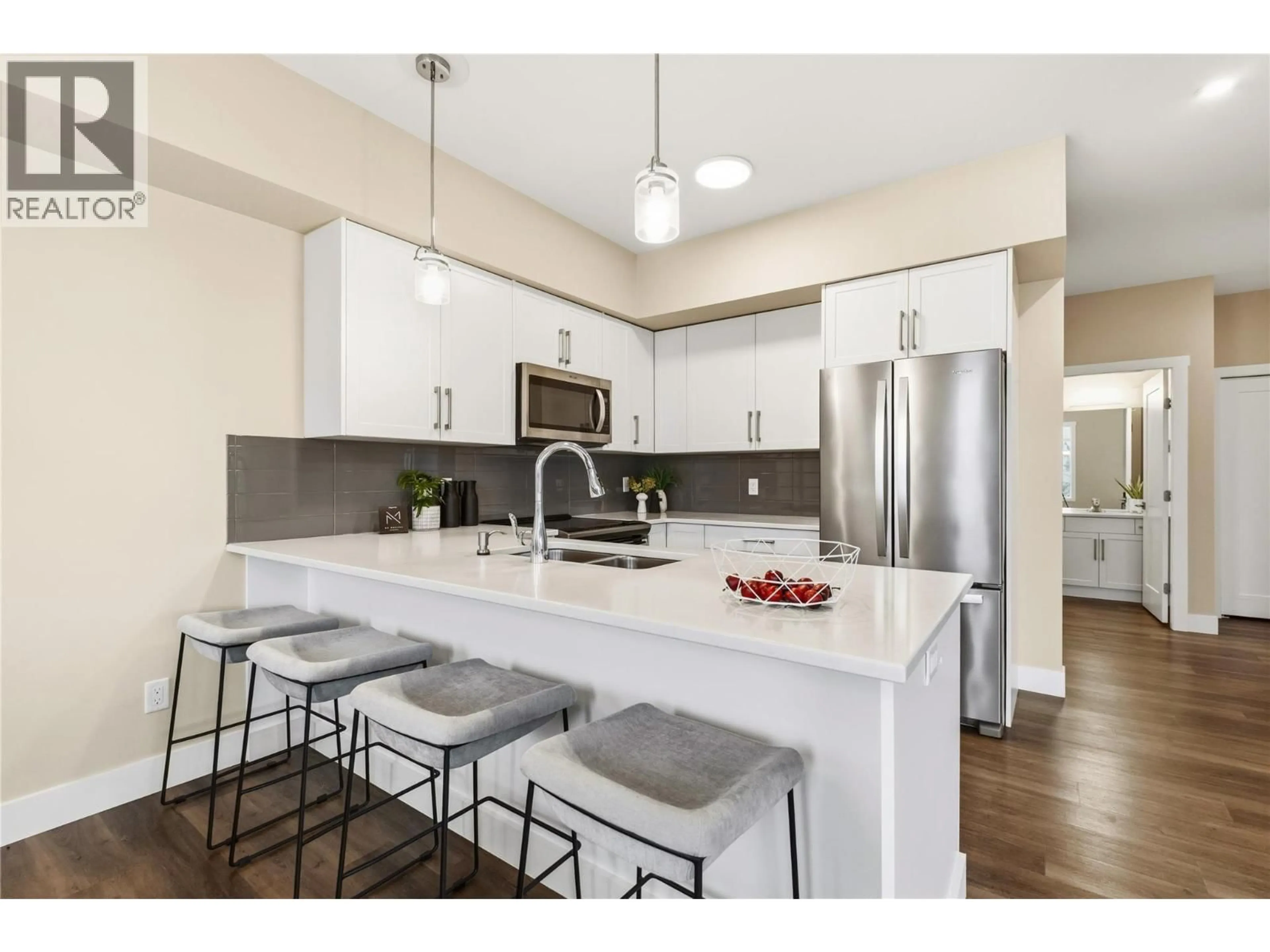 Open concept kitchen, unknown for 313 - 3090 BURTCH ROAD, Kelowna British Columbia V1W5G9