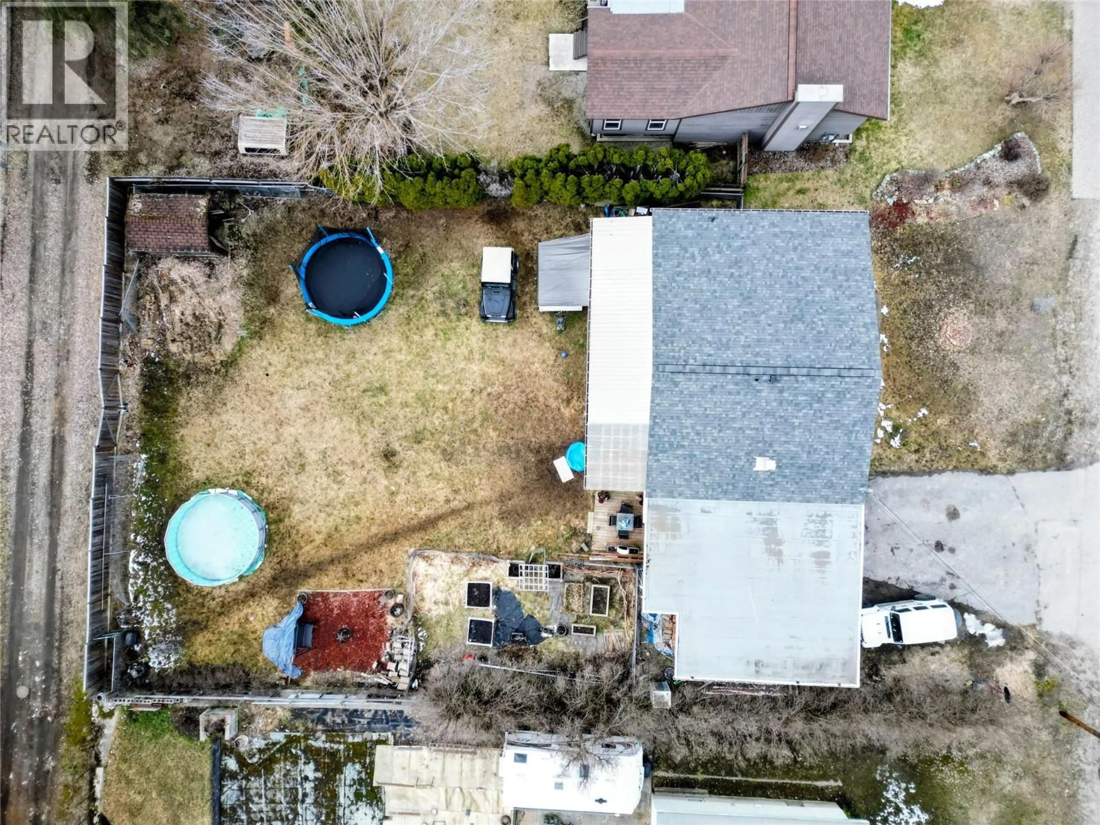 A pic from outside/outdoor area/front of a property/back of a property/a pic from drone, street for 101 PINE AVENUE, Fruitvale British Columbia V0G1L0