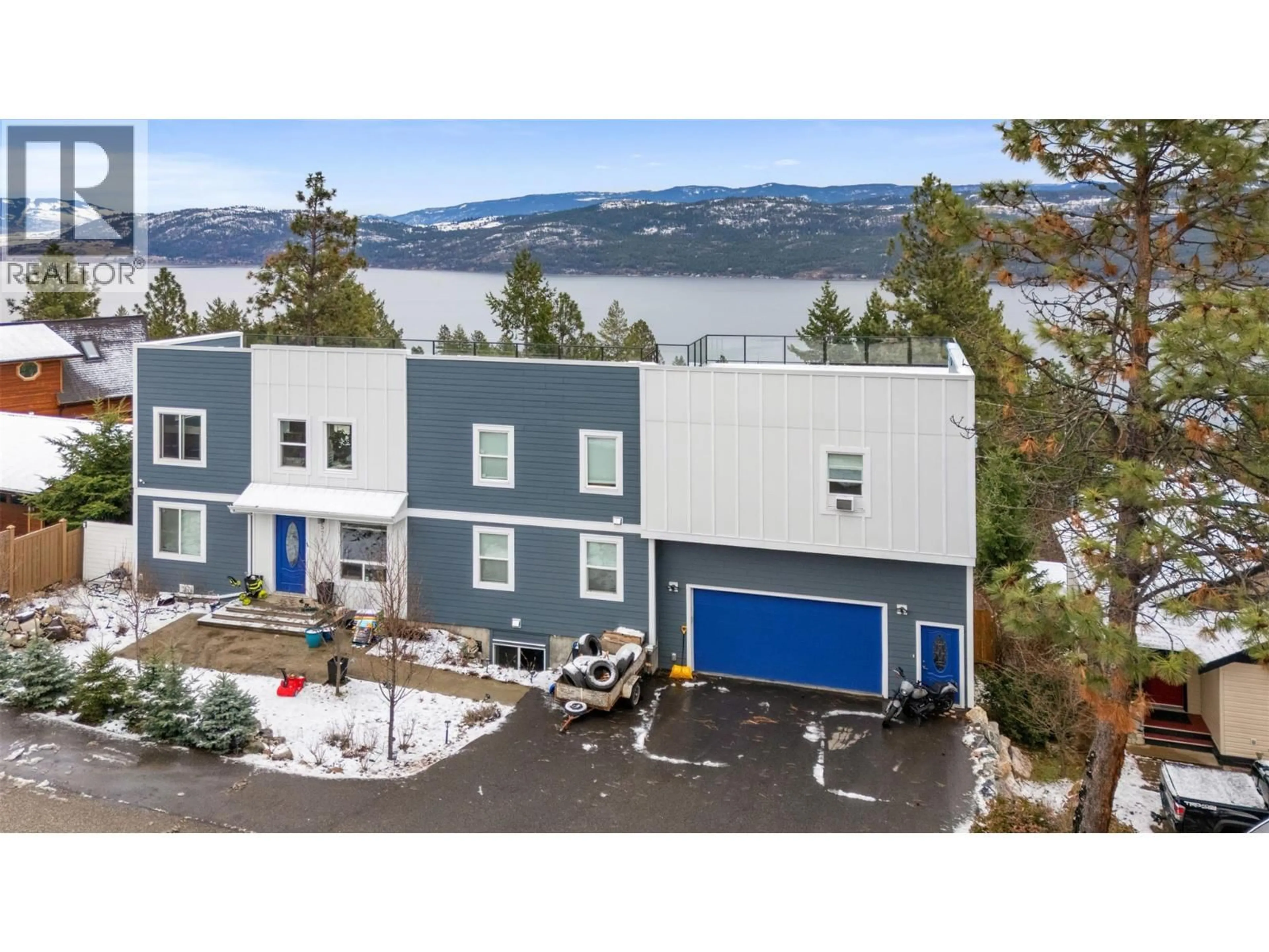 A pic from outside/outdoor area/front of a property/back of a property/a pic from drone, unknown for 571 MOUNTAIN DRIVE, Vernon British Columbia V1H2B7