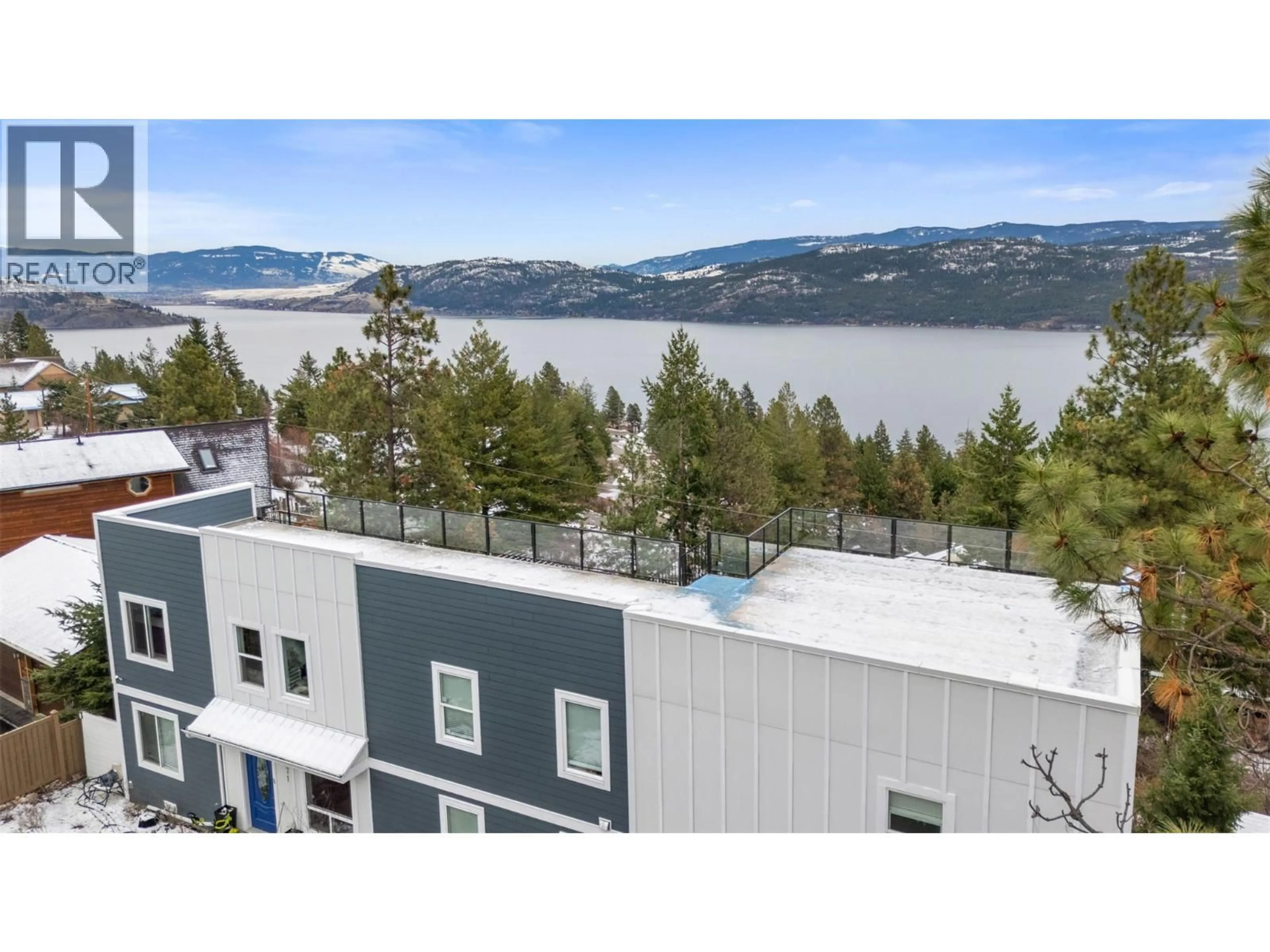 A pic from outside/outdoor area/front of a property/back of a property/a pic from drone, water/lake/river/ocean view for 571 MOUNTAIN DRIVE, Vernon British Columbia V1H2B7