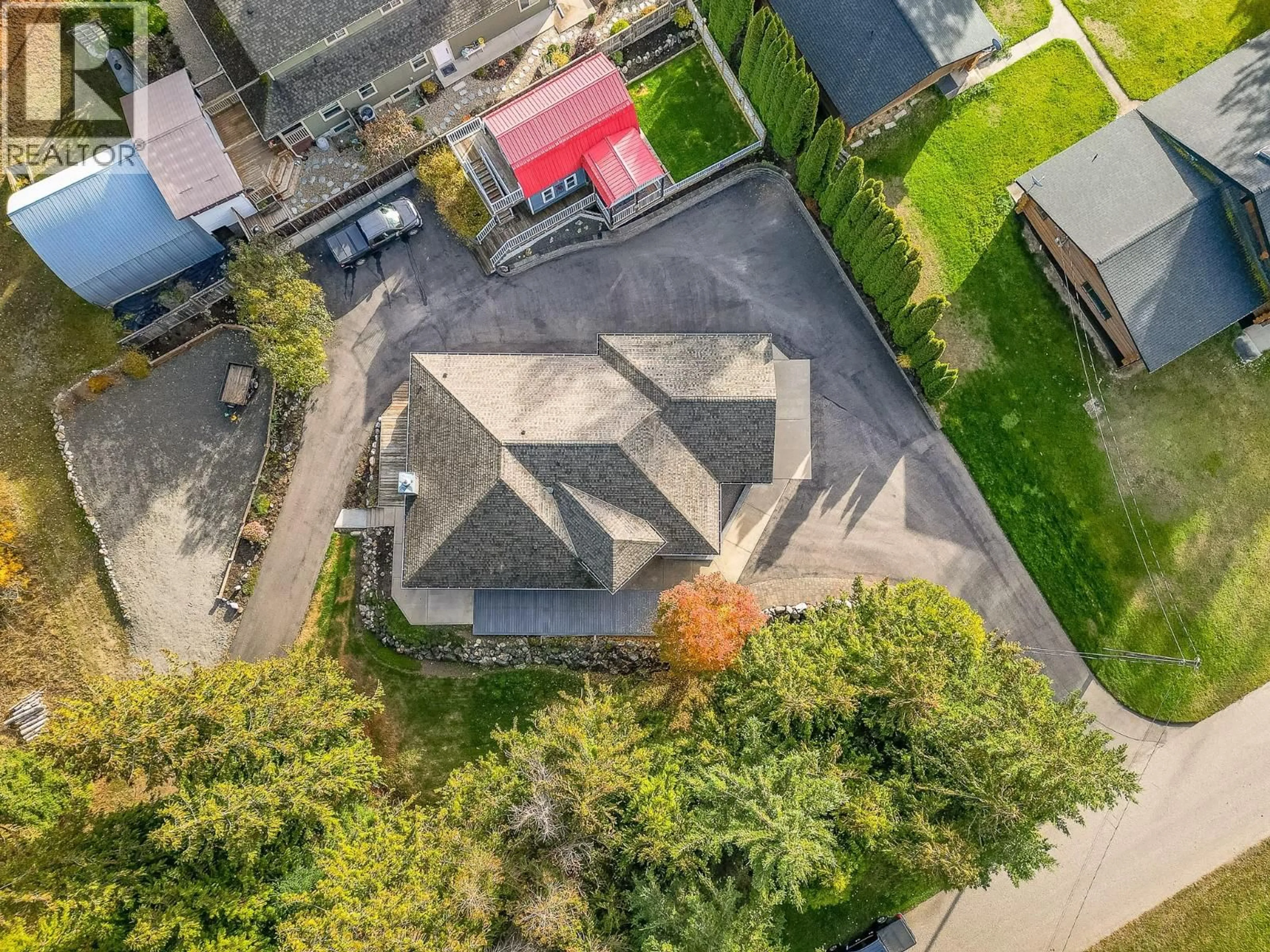 A pic from outside/outdoor area/front of a property/back of a property/a pic from drone, street for 15 PARSONS ROAD, Mara British Columbia V0E2K0