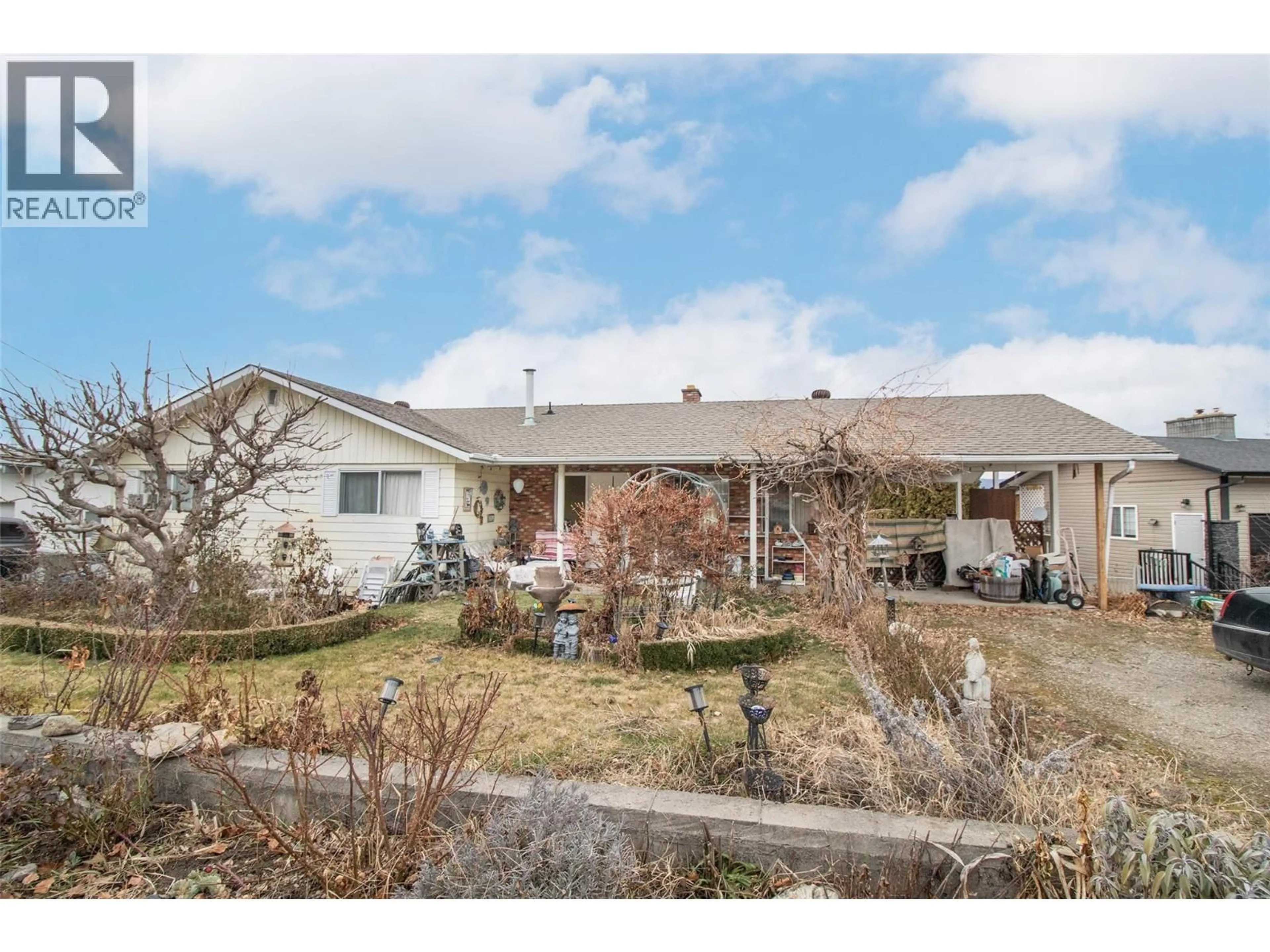 A pic from outside/outdoor area/front of a property/back of a property/a pic from drone, street for 1150 GRAF ROAD, Kelowna British Columbia V1Y7R1