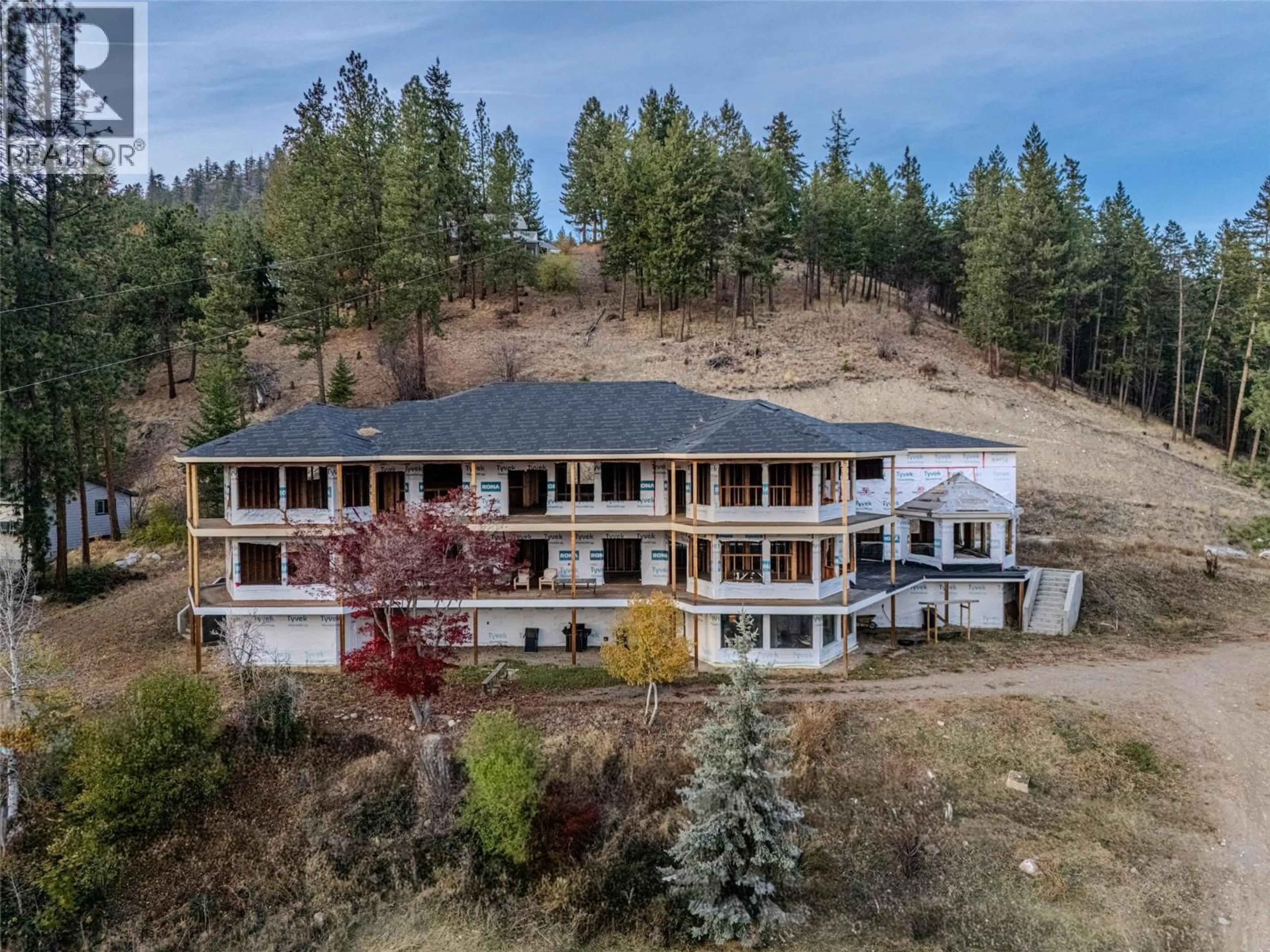 A pic from outside/outdoor area/front of a property/back of a property/a pic from drone, mountain view for 4976 PRINCETON AVENUE, Peachland British Columbia V0H1X8