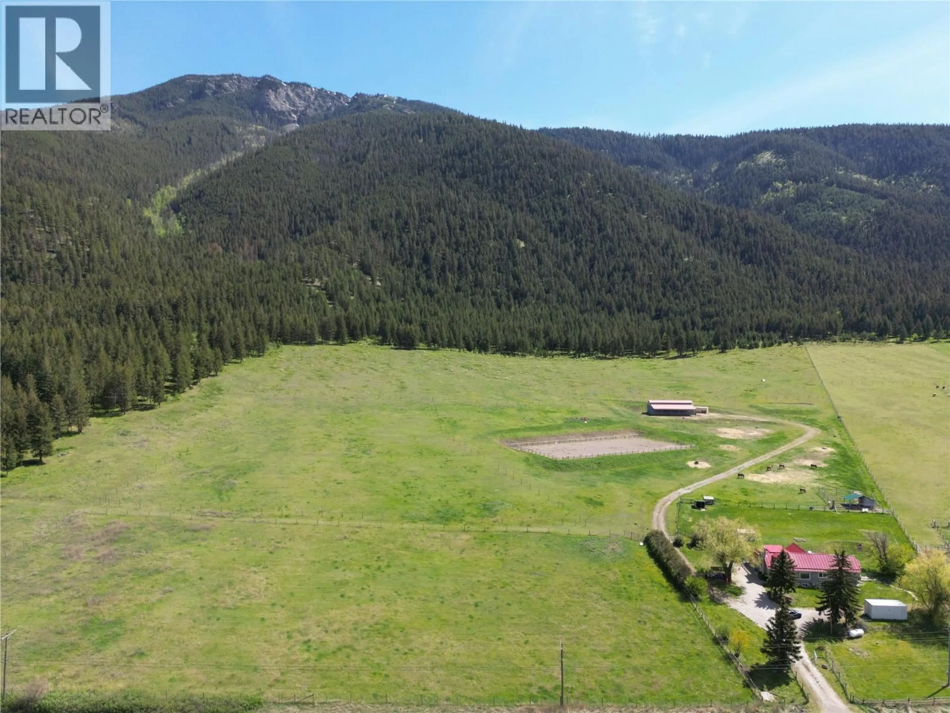 A pic from outside/outdoor area/front of a property/back of a property/a pic from drone, mountain view for 6449 97 HIGHWAY, Falkland British Columbia V0E1W0