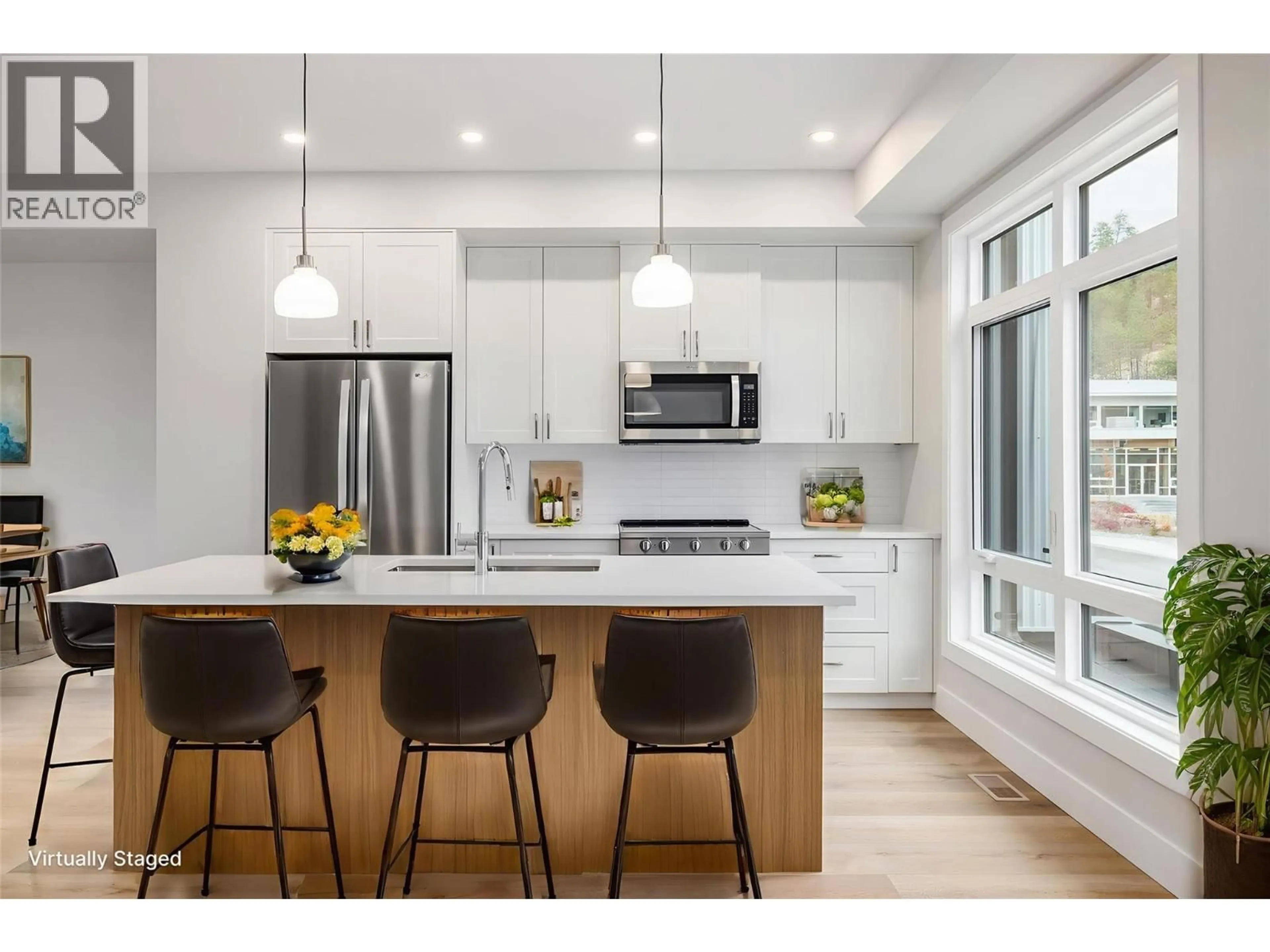 Open concept kitchen, wood/laminate floor for 5 - 3425 HILLTOWN DRIVE, Kelowna British Columbia V1V2B5