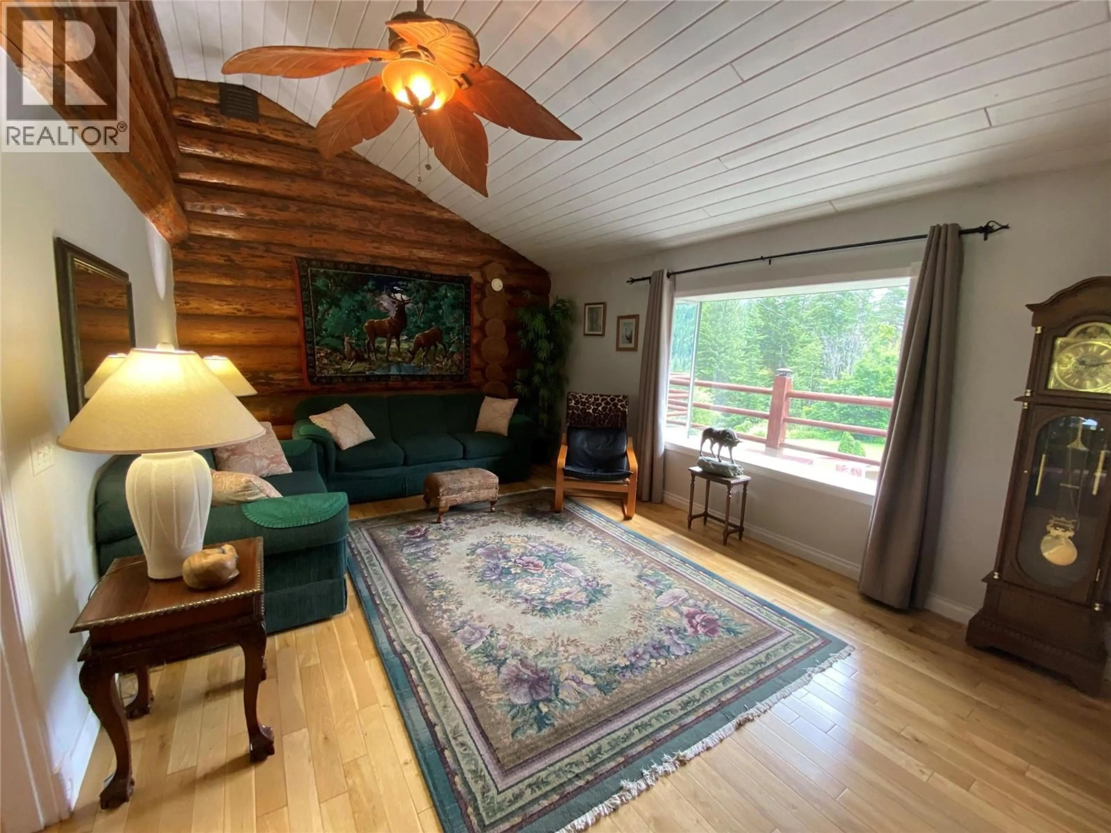 Living room with furniture, wood/laminate floor for 4405 ERIE ROSS-SPUR ROAD, Salmo British Columbia V0G1L1