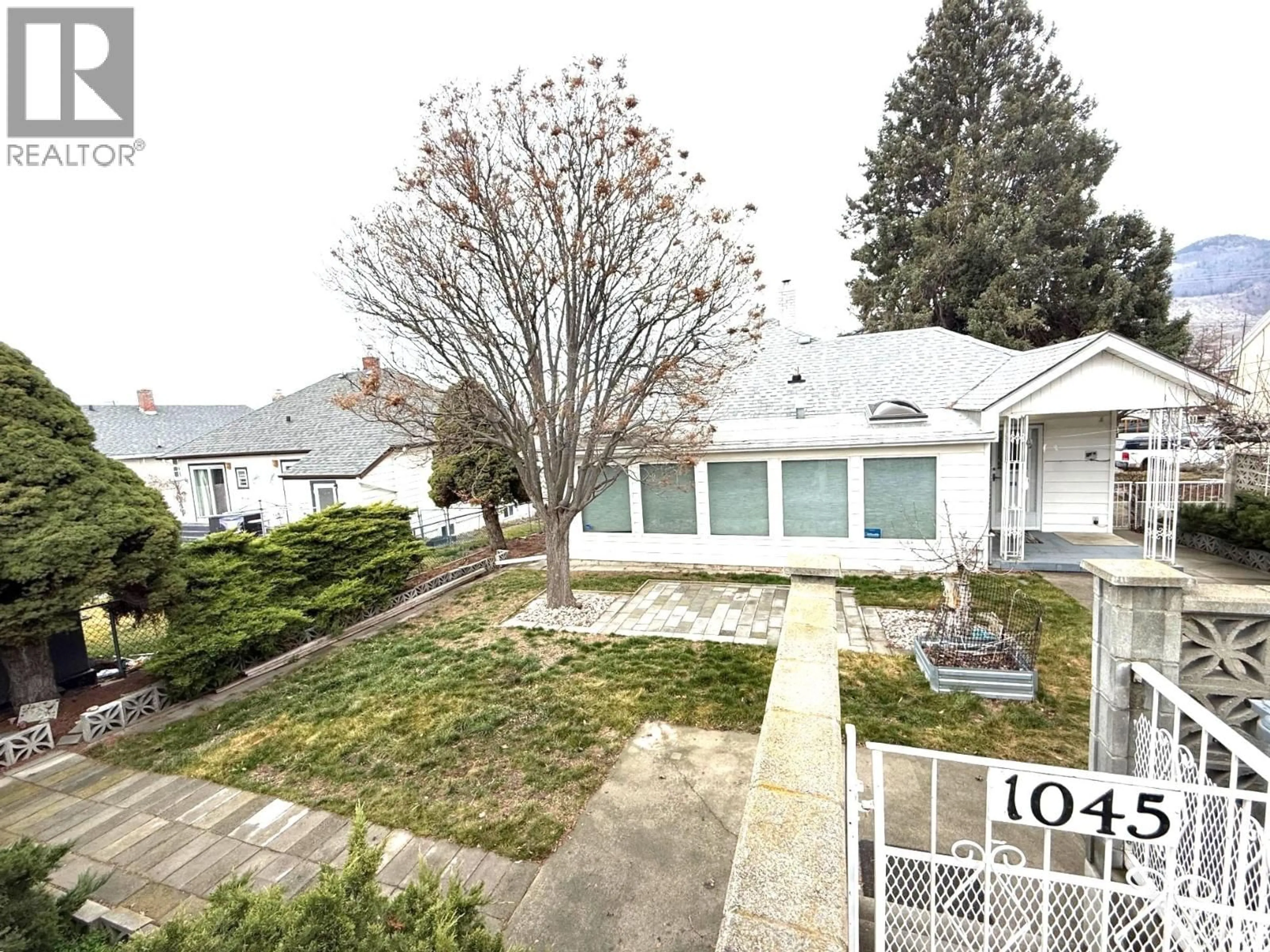 A pic from outside/outdoor area/front of a property/back of a property/a pic from drone, street for 1045 DOMINION STREET, Kamloops British Columbia V2C2Y4