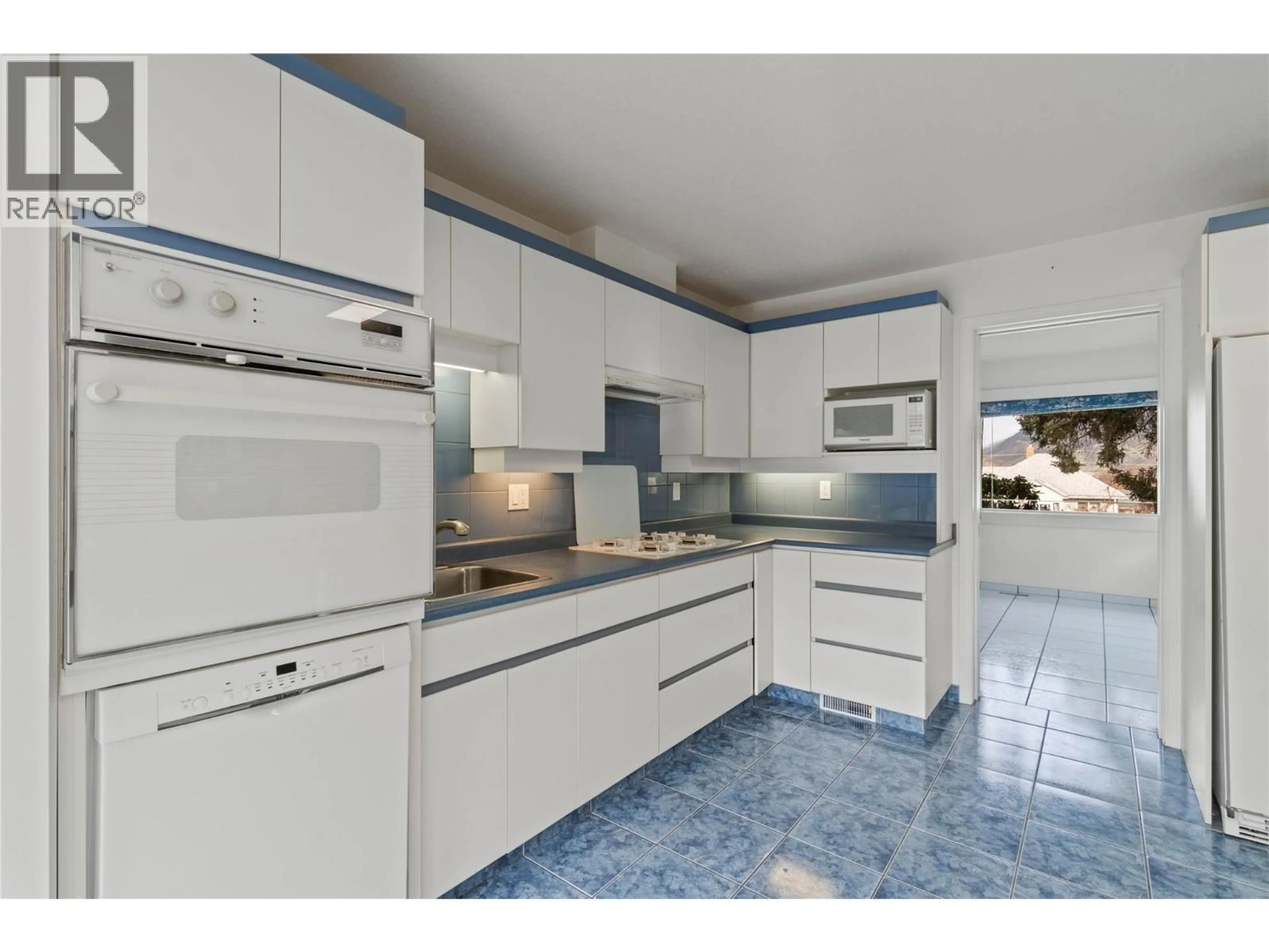 Standard kitchen, ceramic/tile floor for 1045 DOMINION STREET, Kamloops British Columbia V2C2Y4