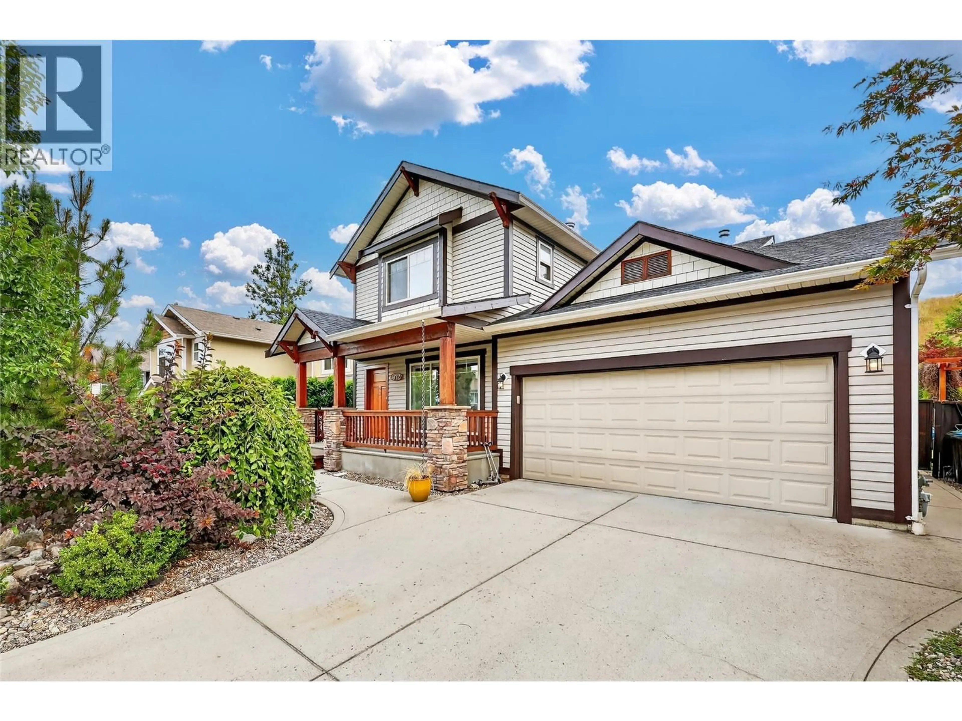 Home with brick exterior material, street for 982 PARET CRESCENT, Kelowna British Columbia V1W4X9