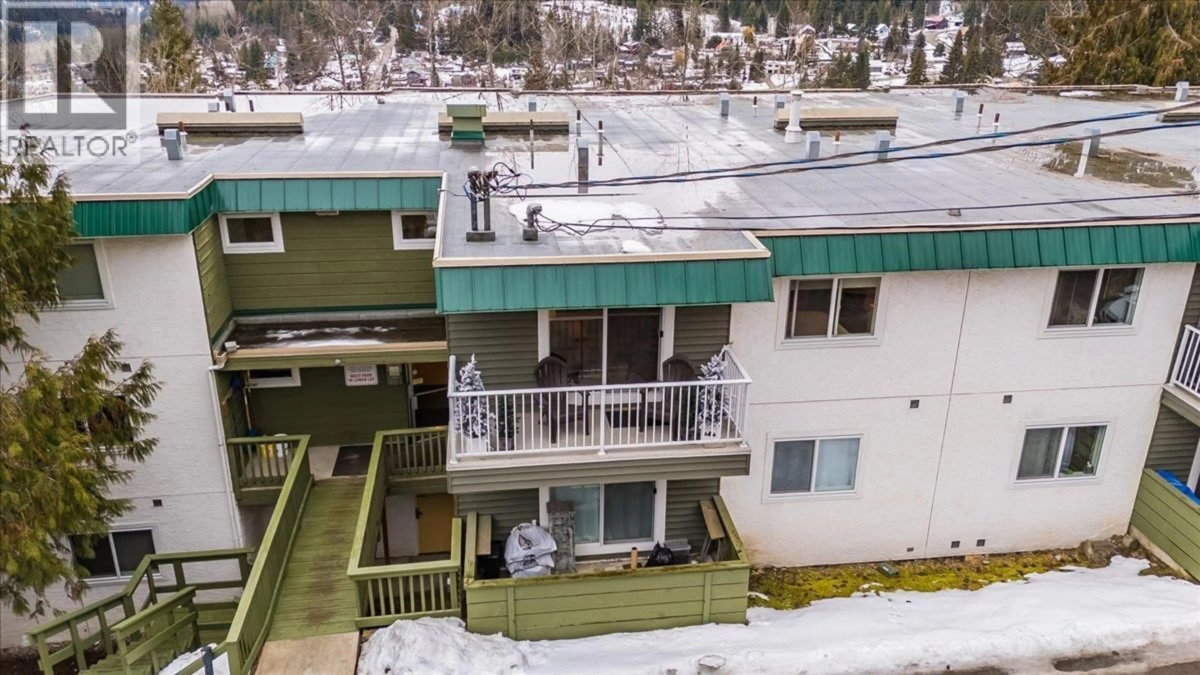 A pic from outside/outdoor area/front of a property/back of a property/a pic from drone, mountain view for 404 - 1611 NICKLEPLATE ROAD, Rossland British Columbia V0G1Y0