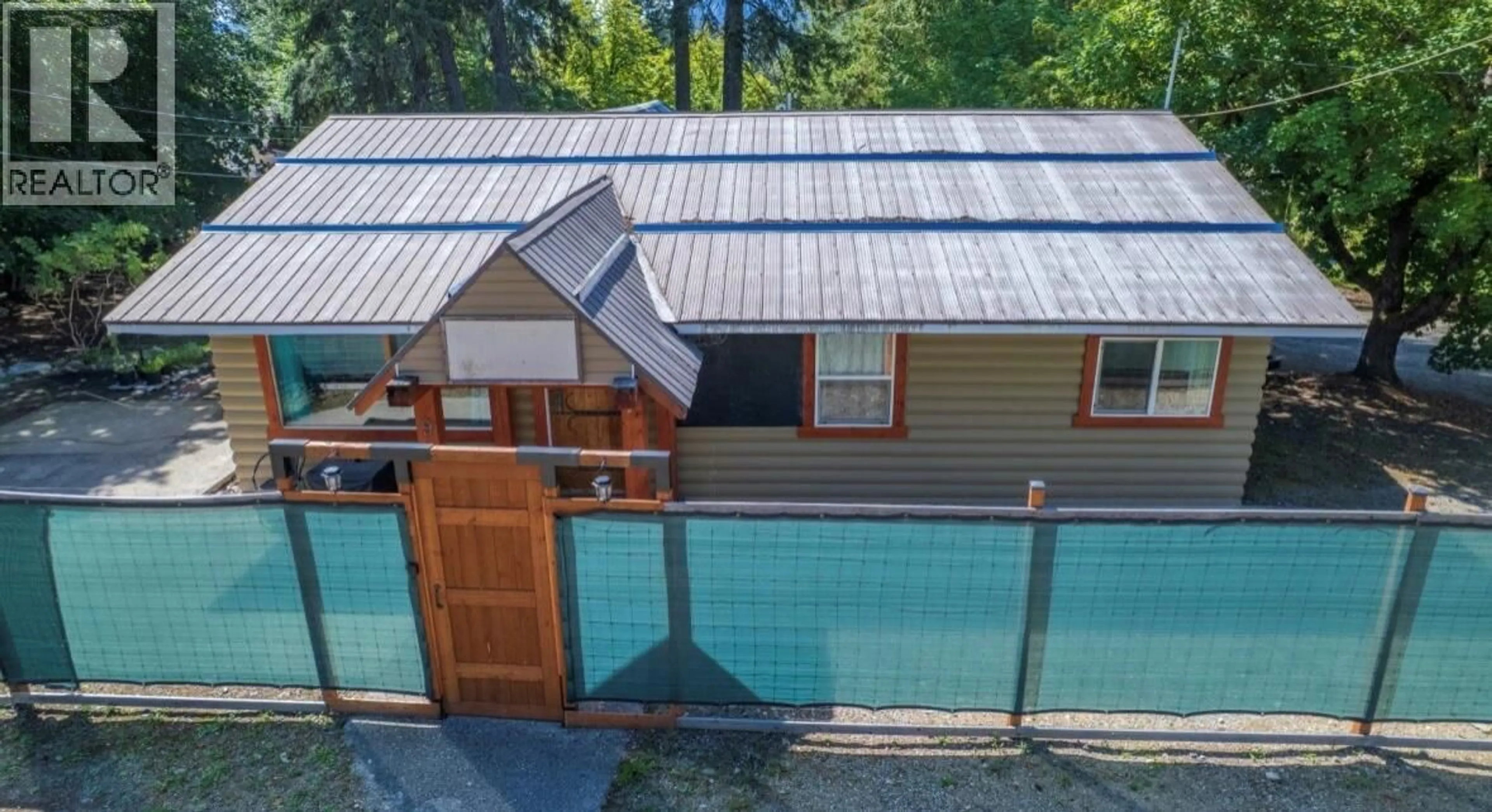 A pic from outside/outdoor area/front of a property/back of a property/a pic from drone, water/lake/river/ocean view for 9&11 KINGSLEY ROAD, Christina Lake British Columbia V0H1E0