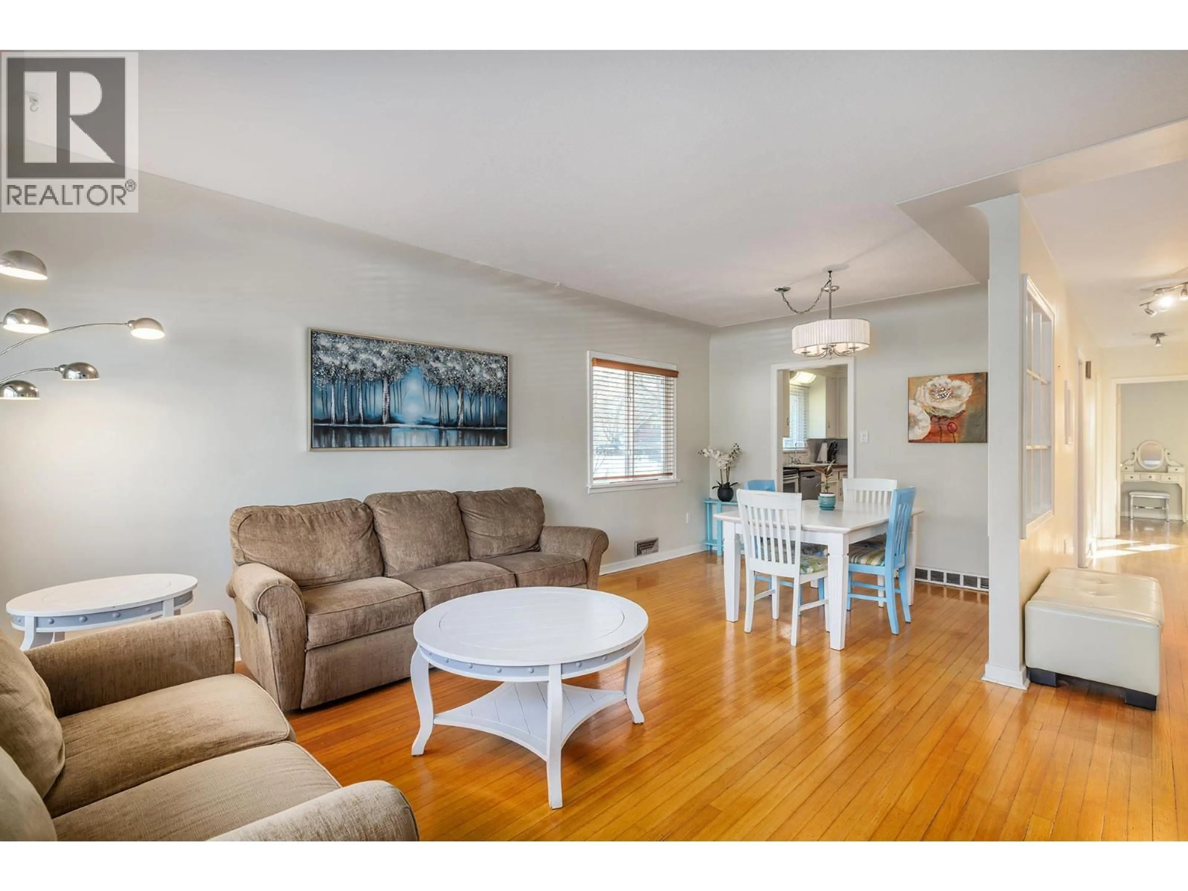 Living room with furniture, wood/laminate floor for 751 SAUCIER AVENUE, Kelowna British Columbia V1Y6A4