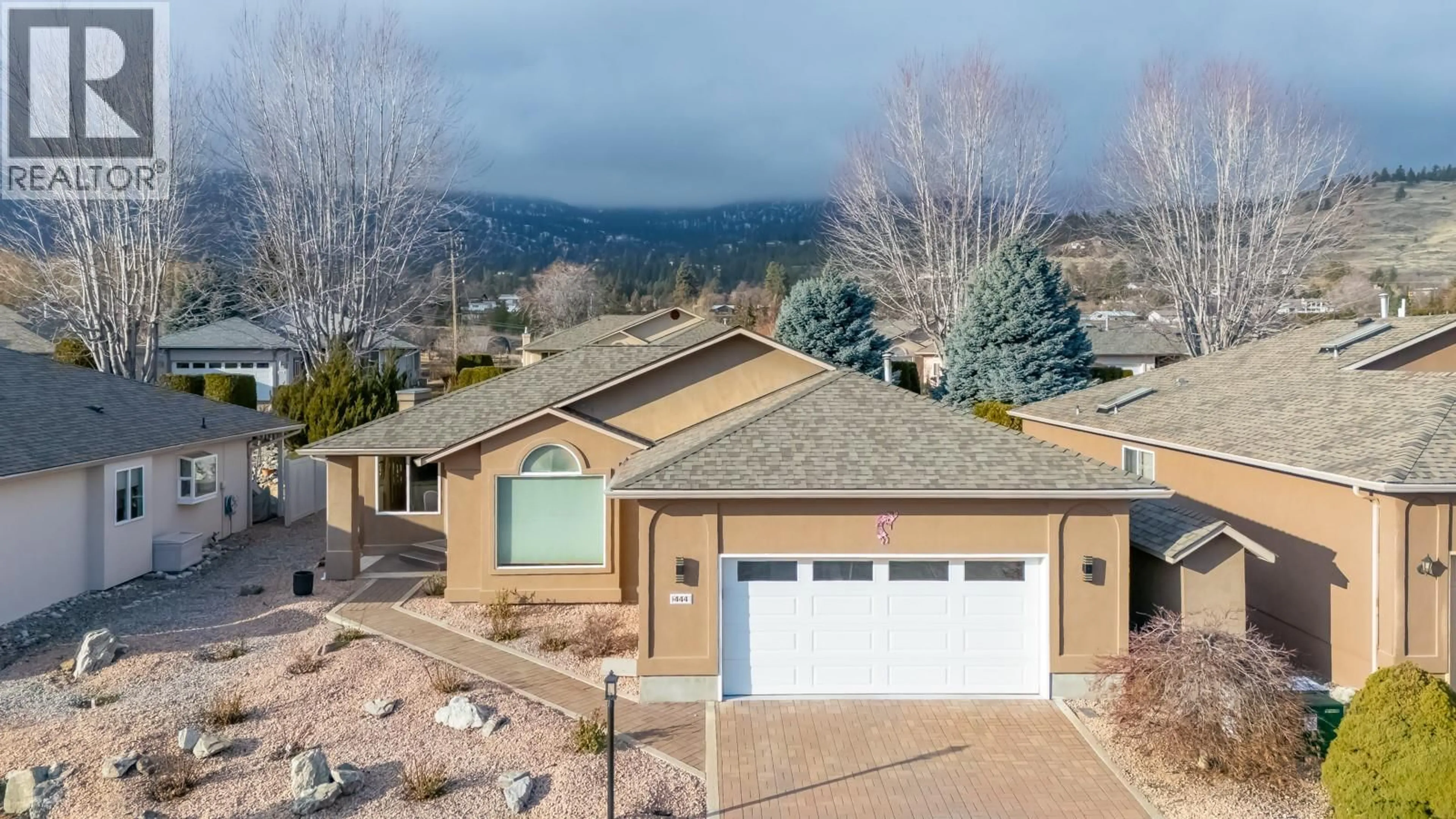 A pic from outside/outdoor area/front of a property/back of a property/a pic from drone, mountain view for 444 RIDGE PLACE, Penticton British Columbia V2A8N7