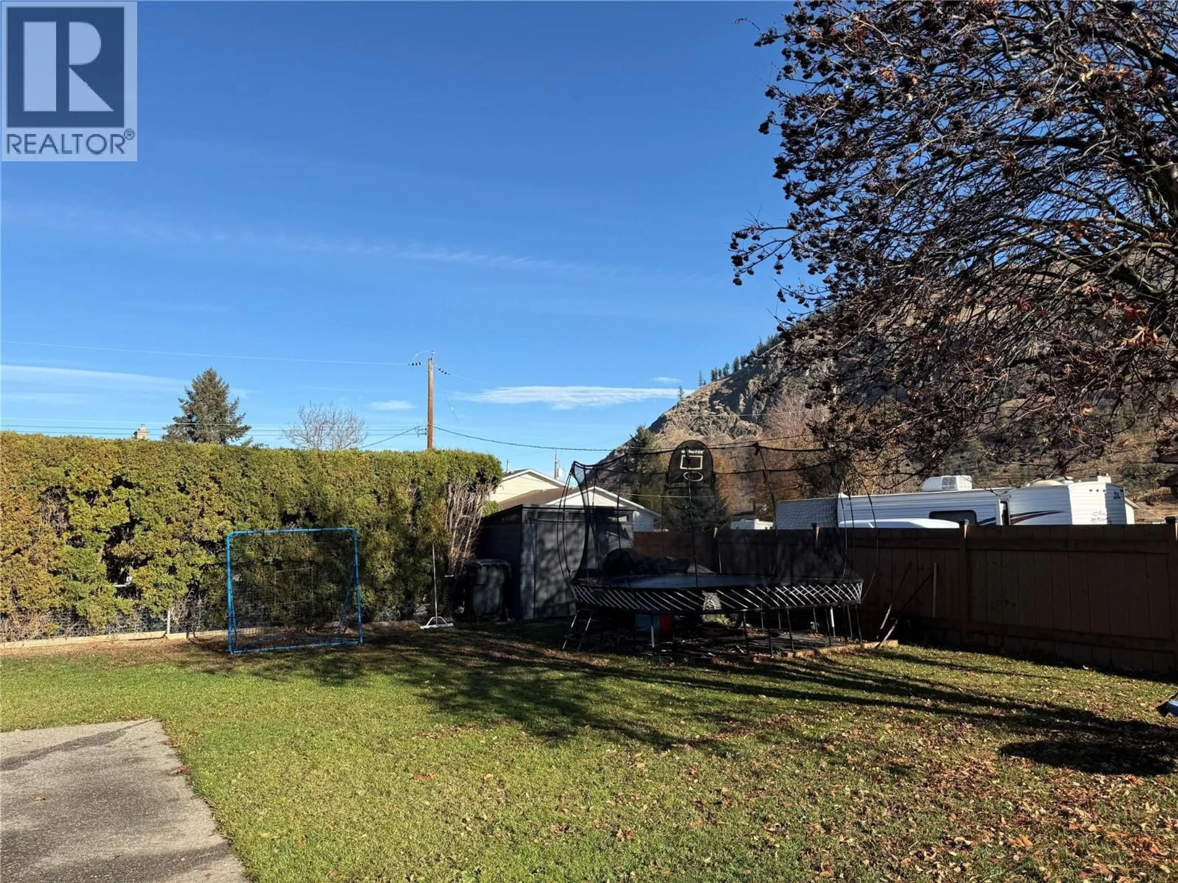 A pic from outside/outdoor area/front of a property/back of a property/a pic from drone, street for 371 MONTEGO ROAD, Kamloops British Columbia V2H1N1