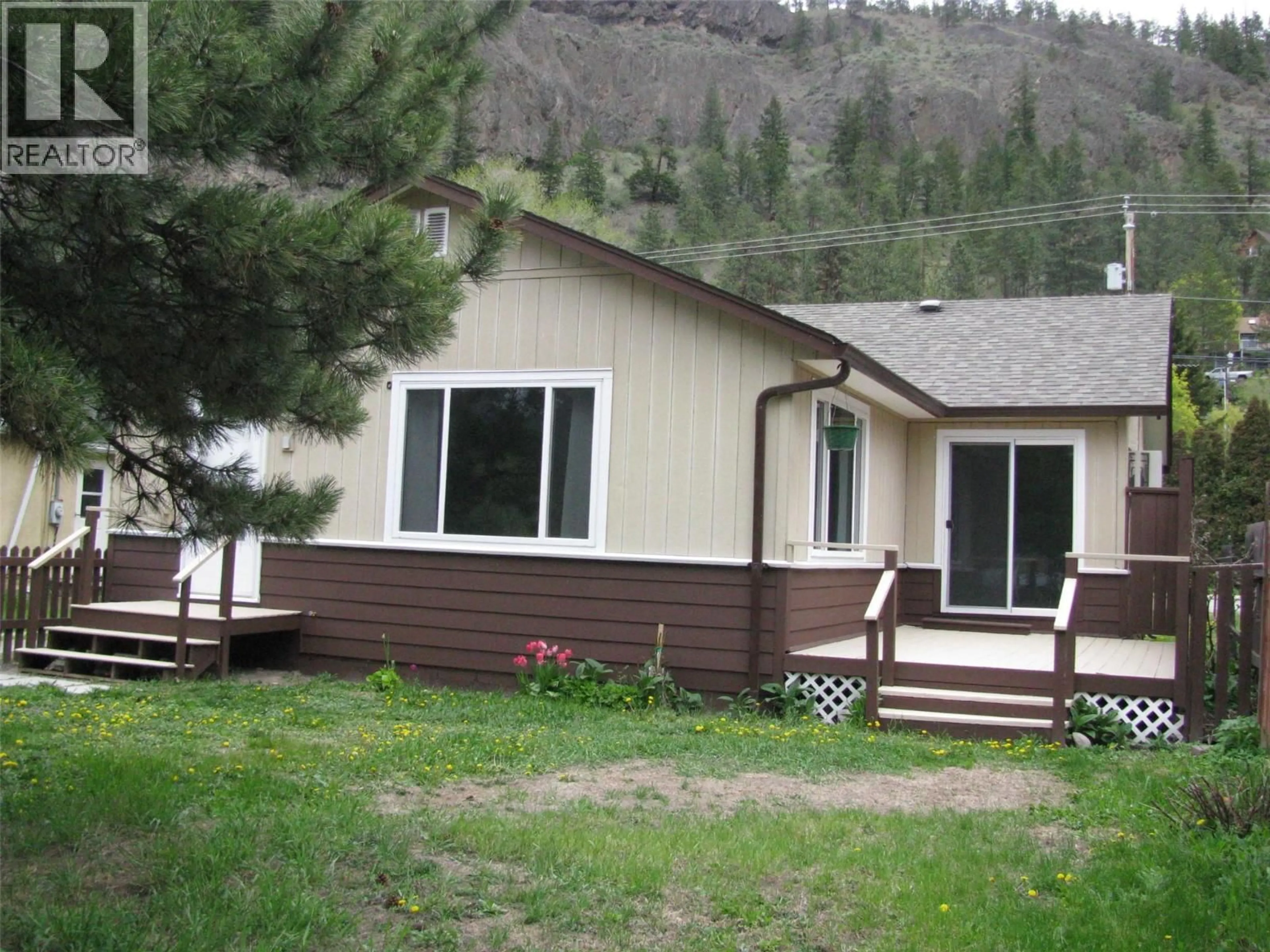 Home with vinyl exterior material, mountain view for 11018 VICTORIA ROAD SOUTH, Summerland British Columbia V0H1Z2