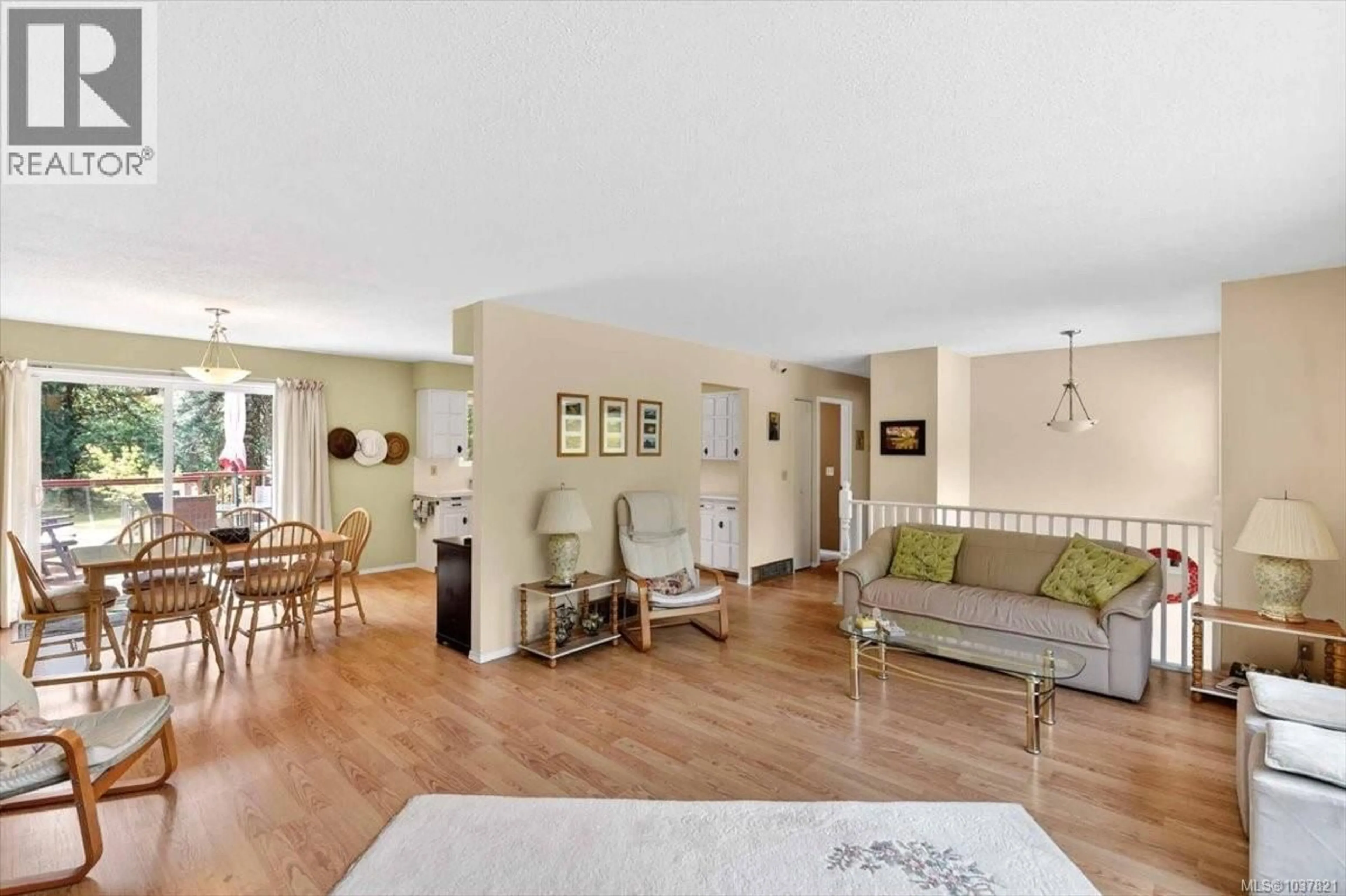 Living room with furniture, wood/laminate floor for 5996 MALABAR ROAD, Port Alberni British Columbia V9Y8L2