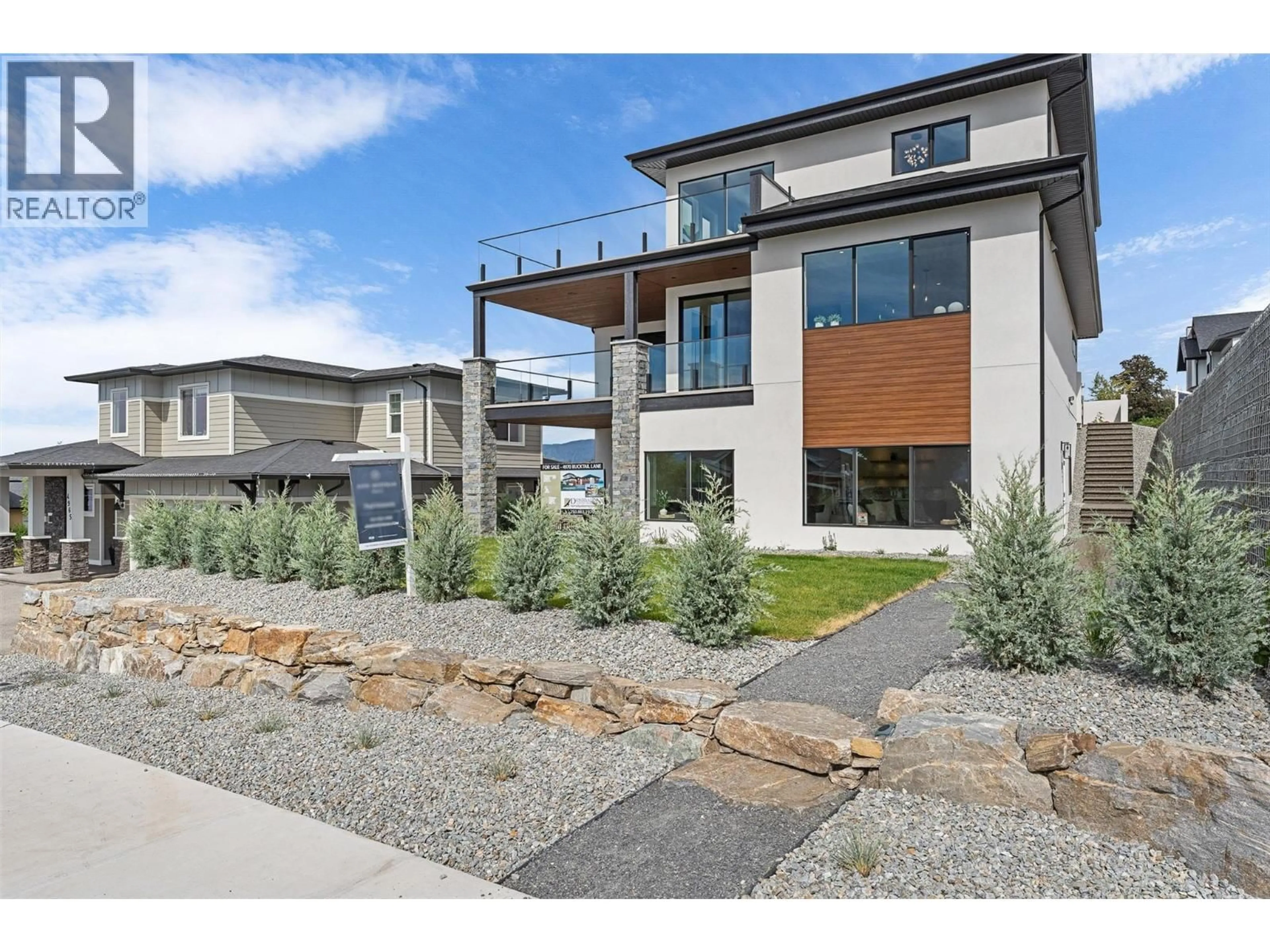 Home with brick exterior material, street for 4970 BUCKTAIL LANE, Kelowna British Columbia V1W5L3