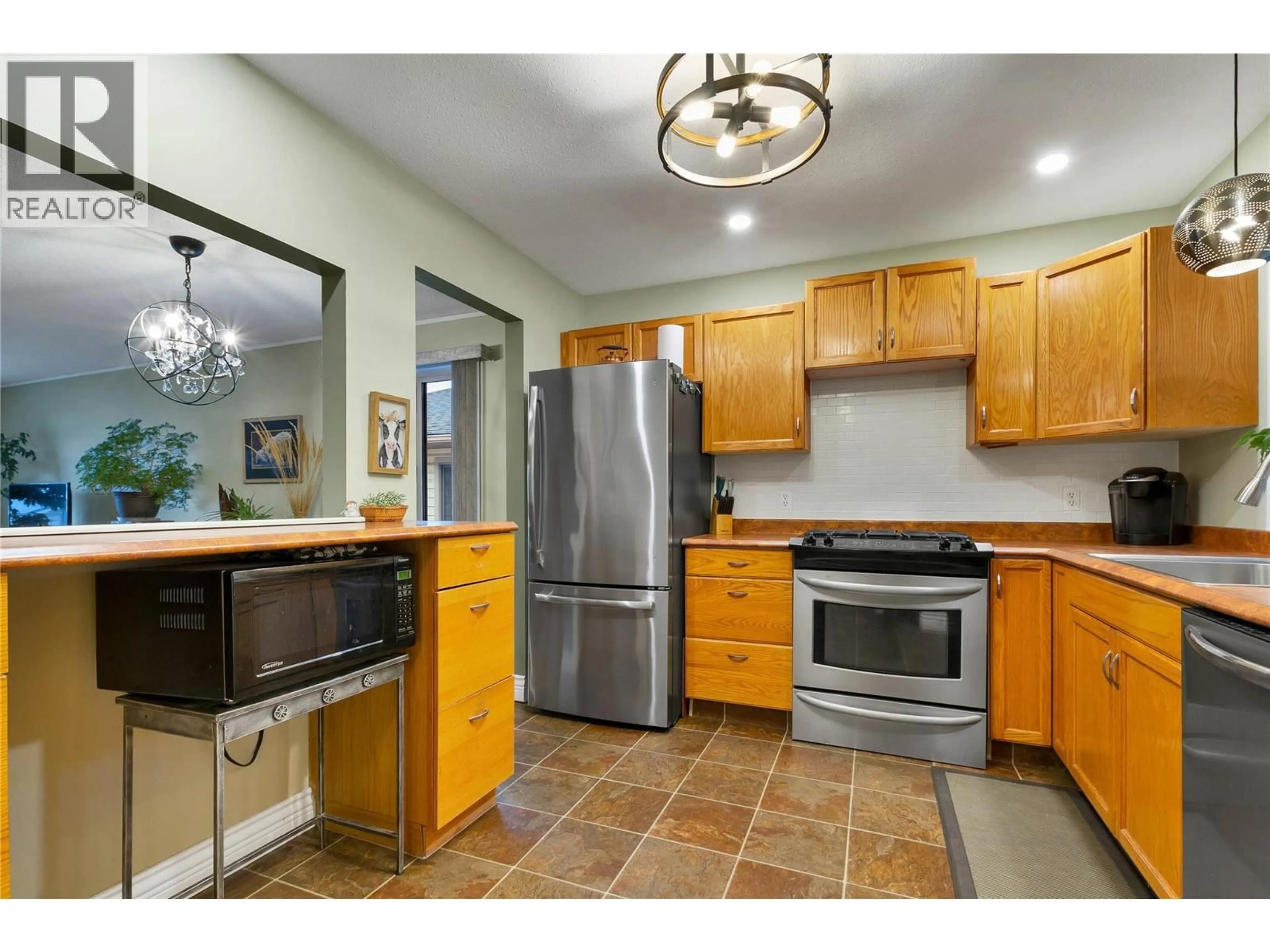 Open concept kitchen, ceramic/tile floor for 34 - 4303 27 AVENUE, Vernon British Columbia V1T6L2