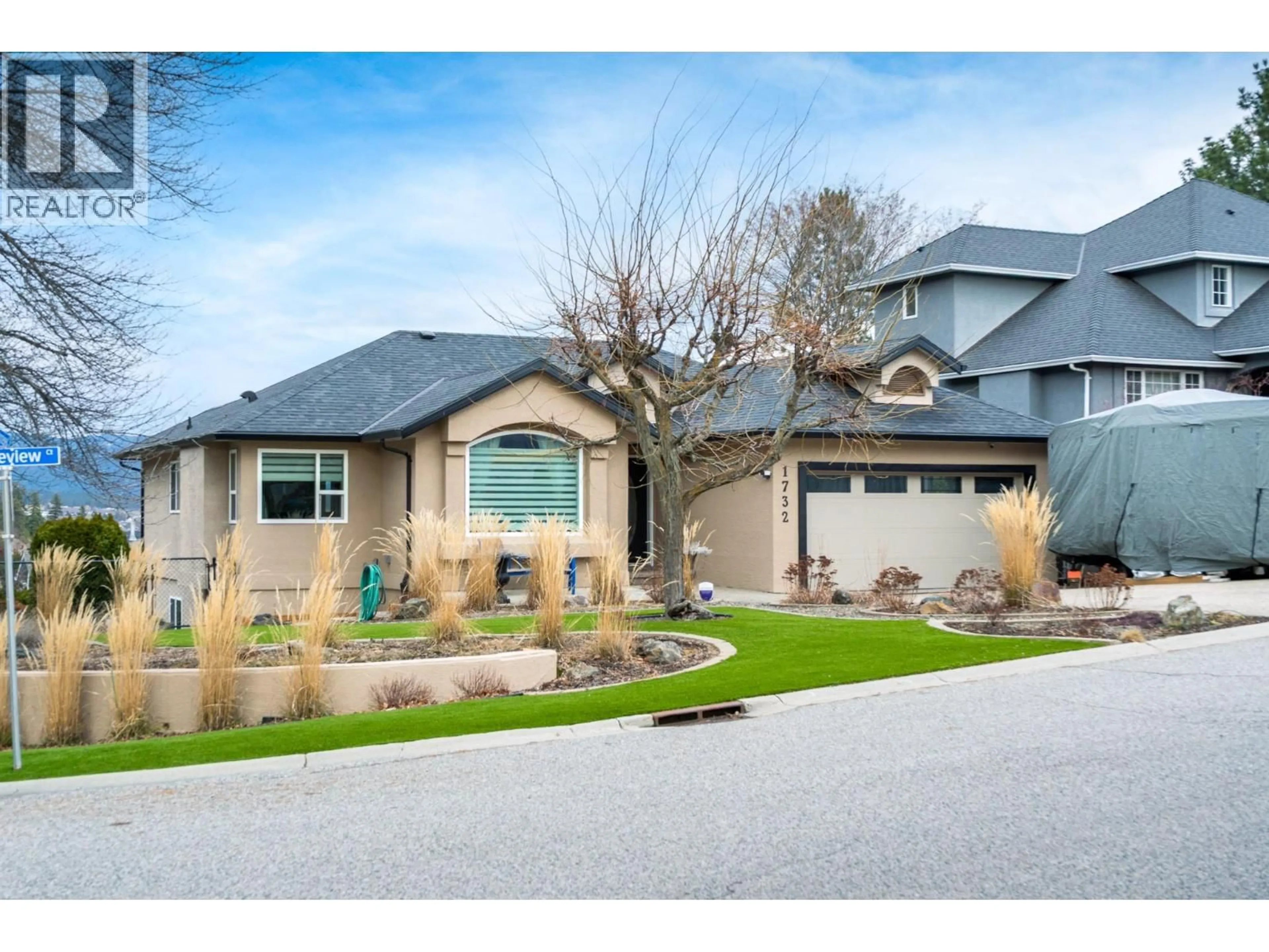 Home with brick exterior material, street for 1732 SPRUCEVIEW COURT, Kelowna British Columbia V1Y7R1
