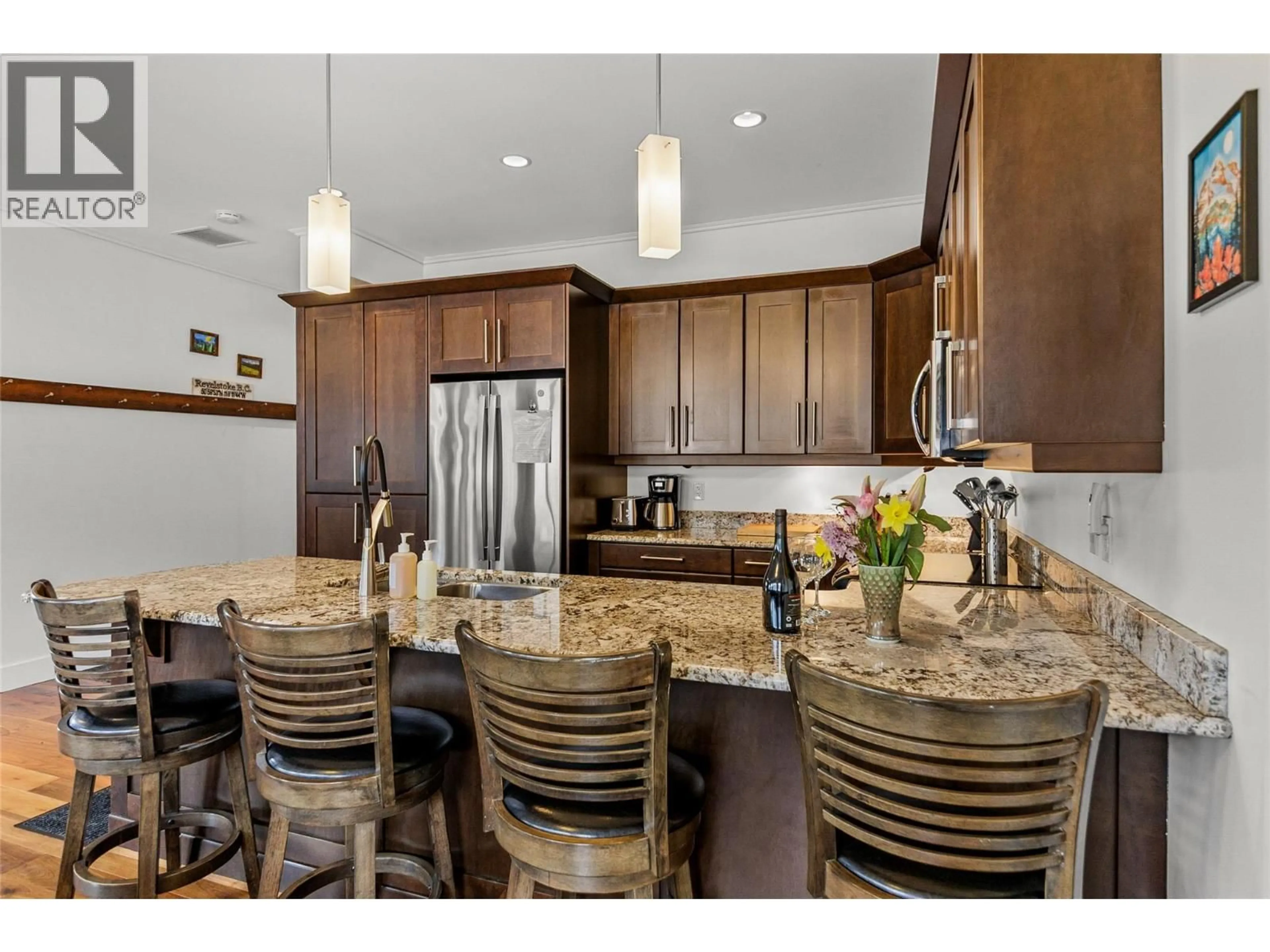 Open concept kitchen, ceramic/tile floor for 301 - 309 1 STREET WEST, Revelstoke British Columbia V0E2S0