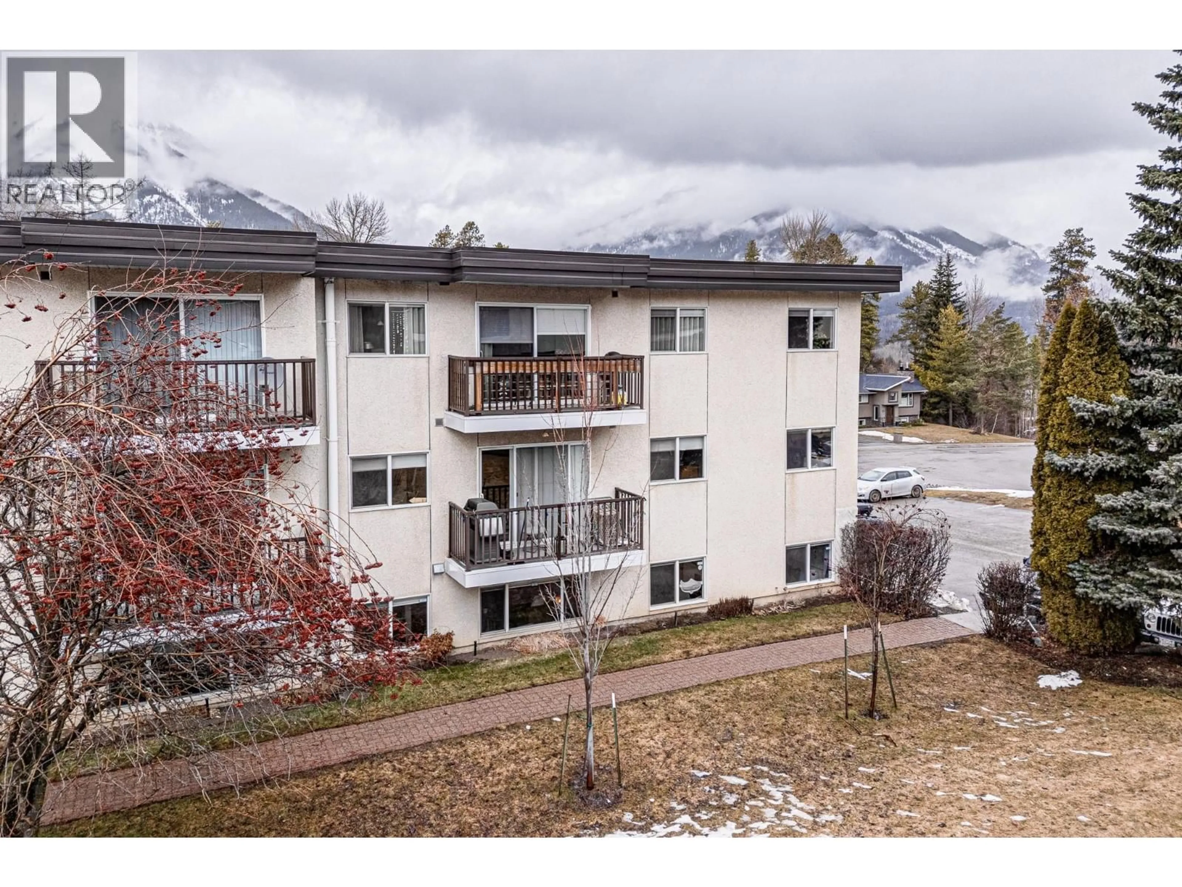 A pic from outside/outdoor area/front of a property/back of a property/a pic from drone, mountain view for 102 - 40 RIDGEMONT AVENUE, Fernie British Columbia V0B1M2