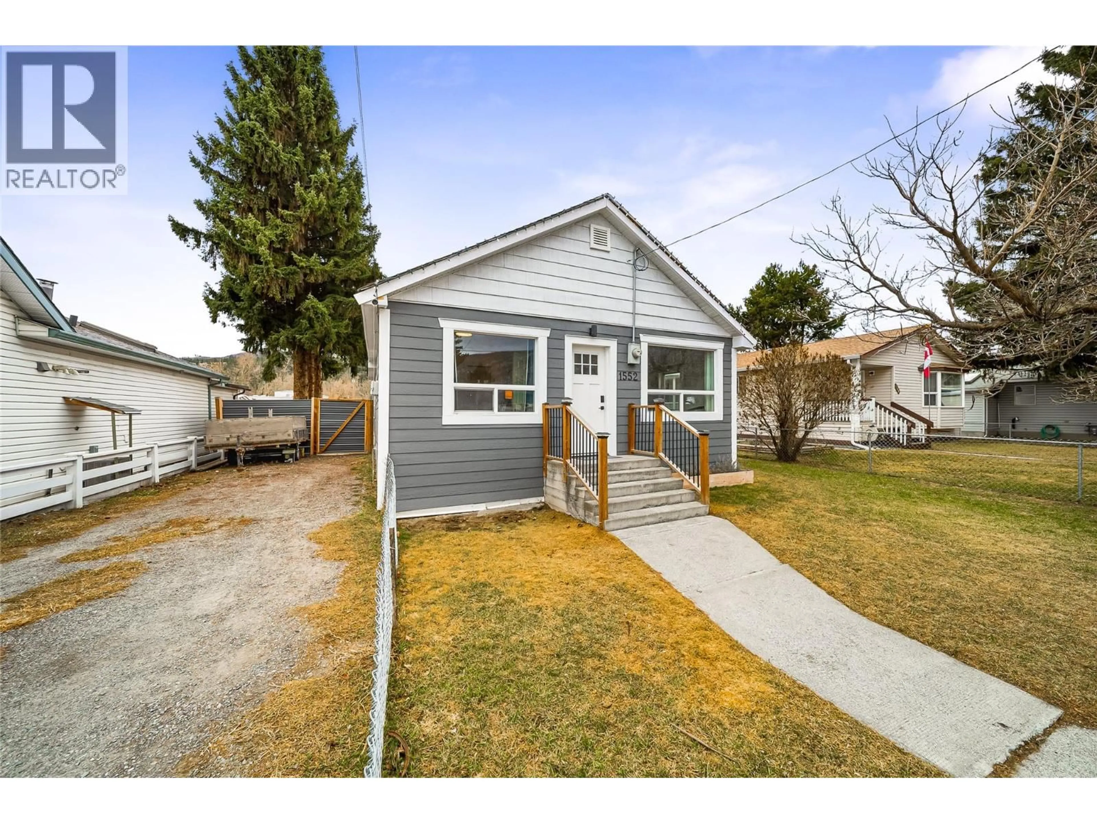 Home with vinyl exterior material, street for 1552 CANFORD AVENUE, Merritt British Columbia V1K1B8