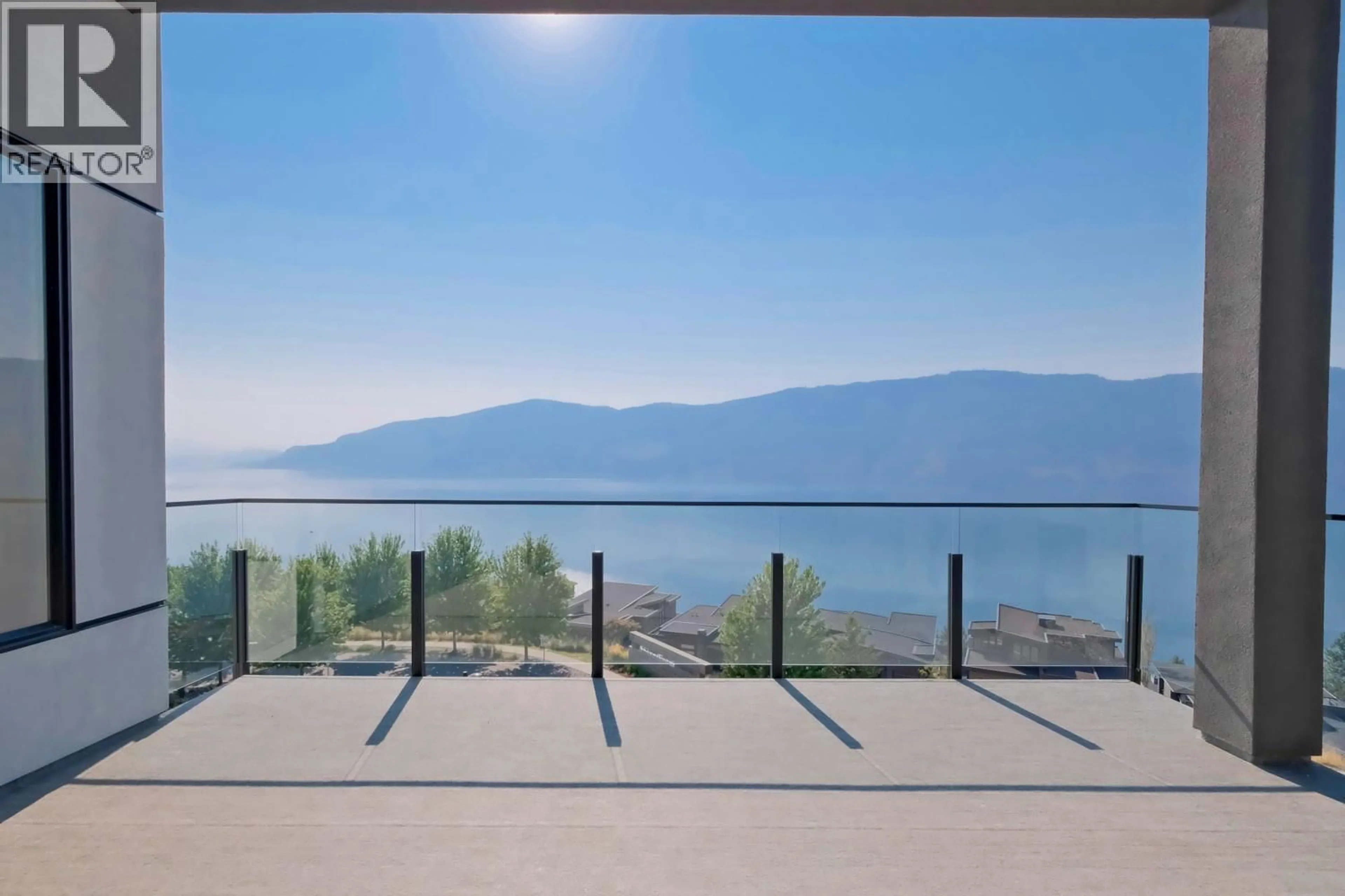 Patio, water/lake/river/ocean view for 10 - 9201 OKANAGAN CENTRE ROAD WEST, Lake Country British Columbia V4V0B8