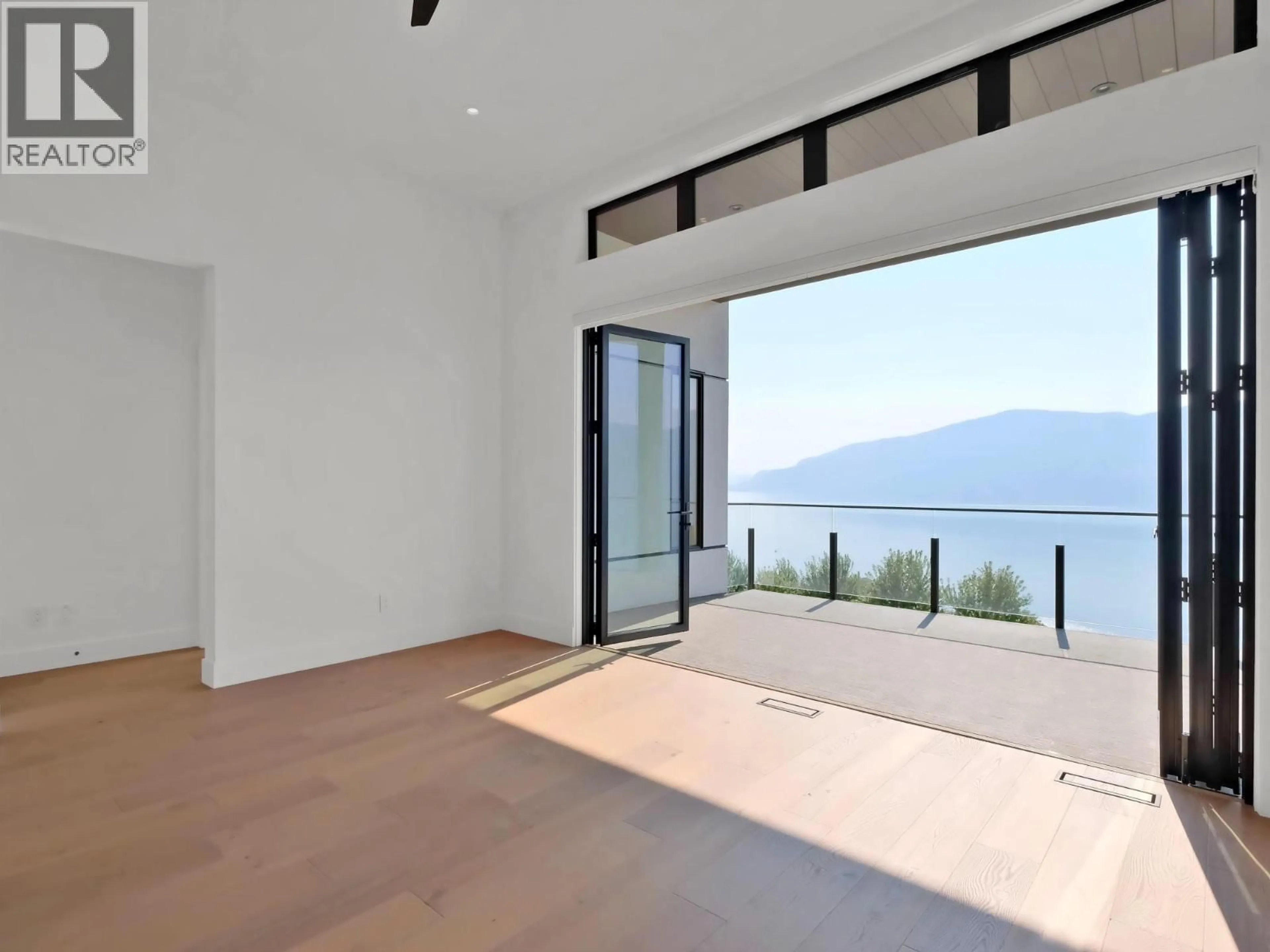 Indoor foyer for 10 - 9201 OKANAGAN CENTRE ROAD WEST, Lake Country British Columbia V4V0B8