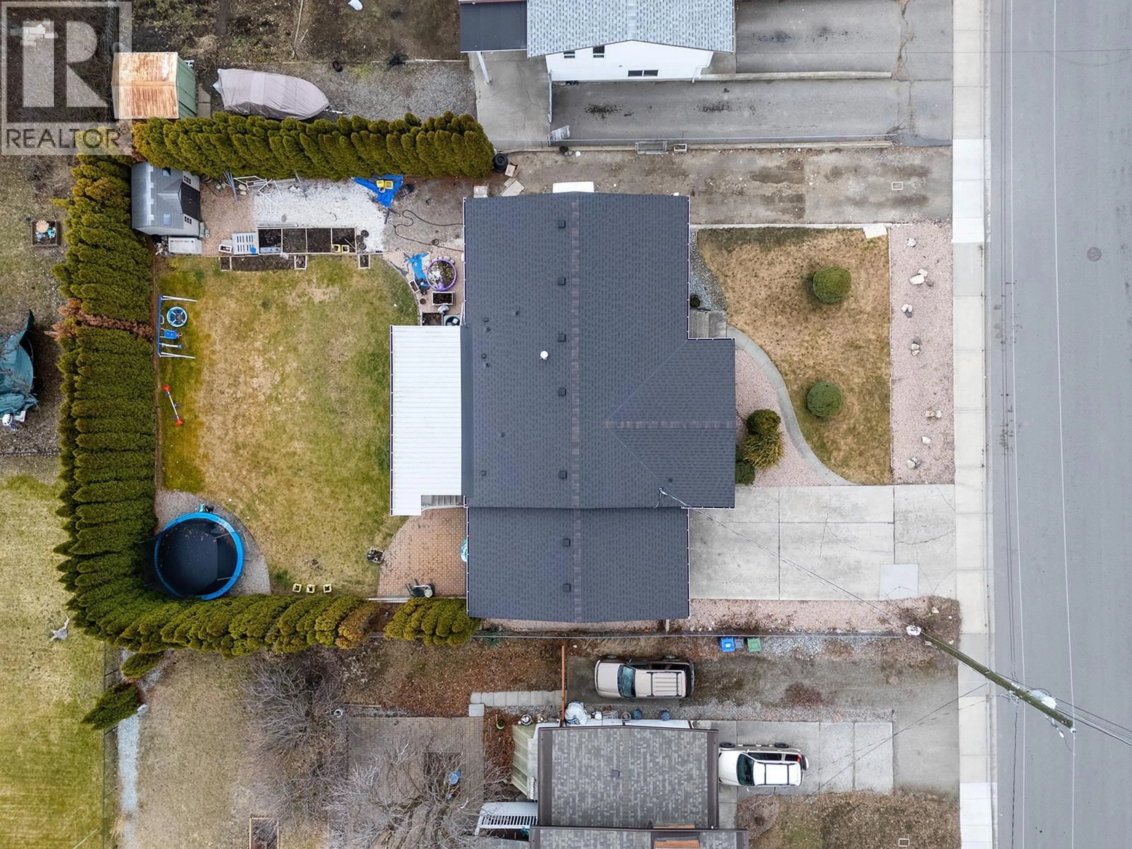 A pic from outside/outdoor area/front of a property/back of a property/a pic from drone, street for 217 HOLBROOK ROAD WEST, Kelowna British Columbia V1X1S1