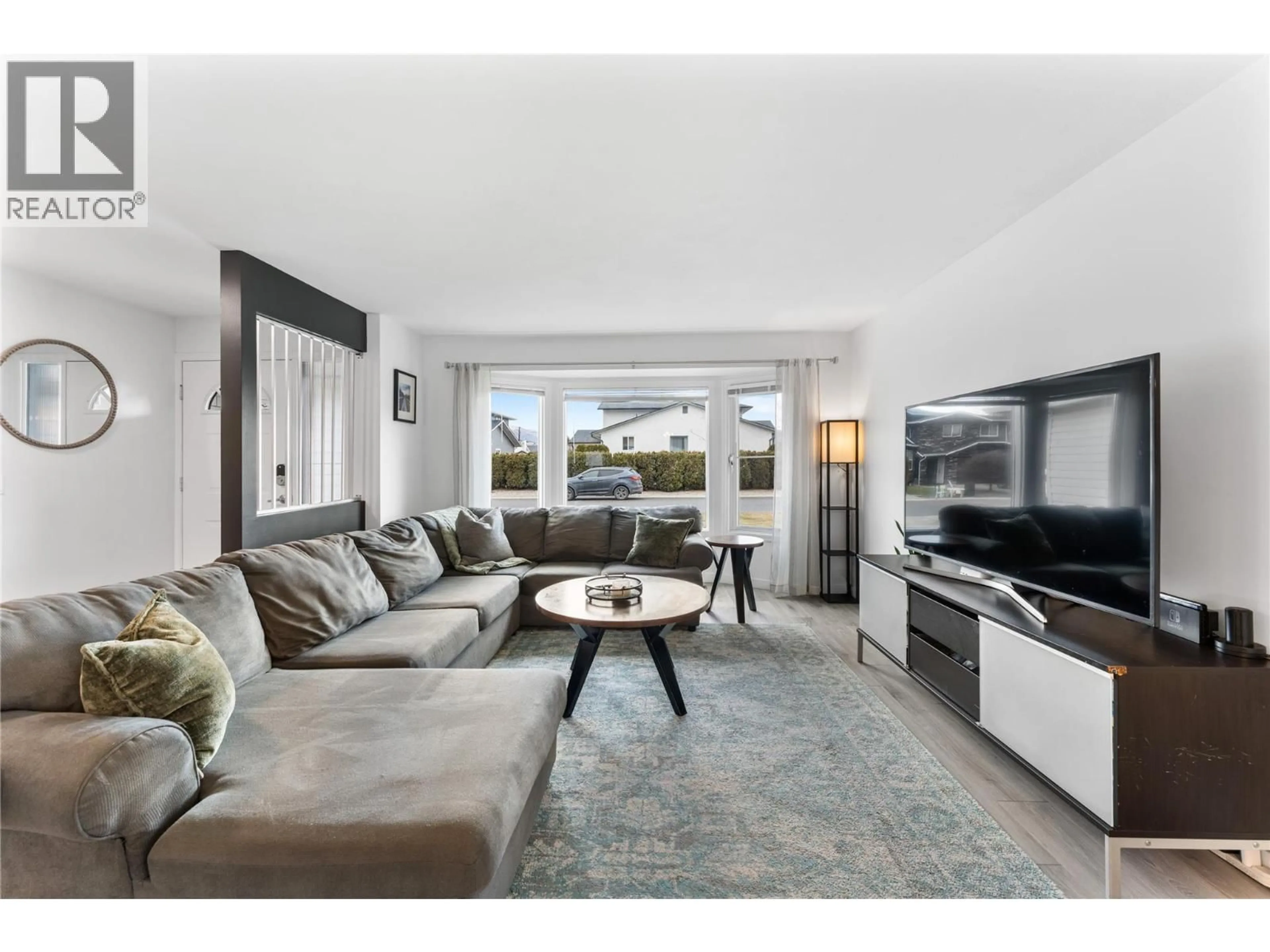 Living room with furniture, unknown for 885 WINTERGREEN DRIVE, Kelowna British Columbia V1W3V9