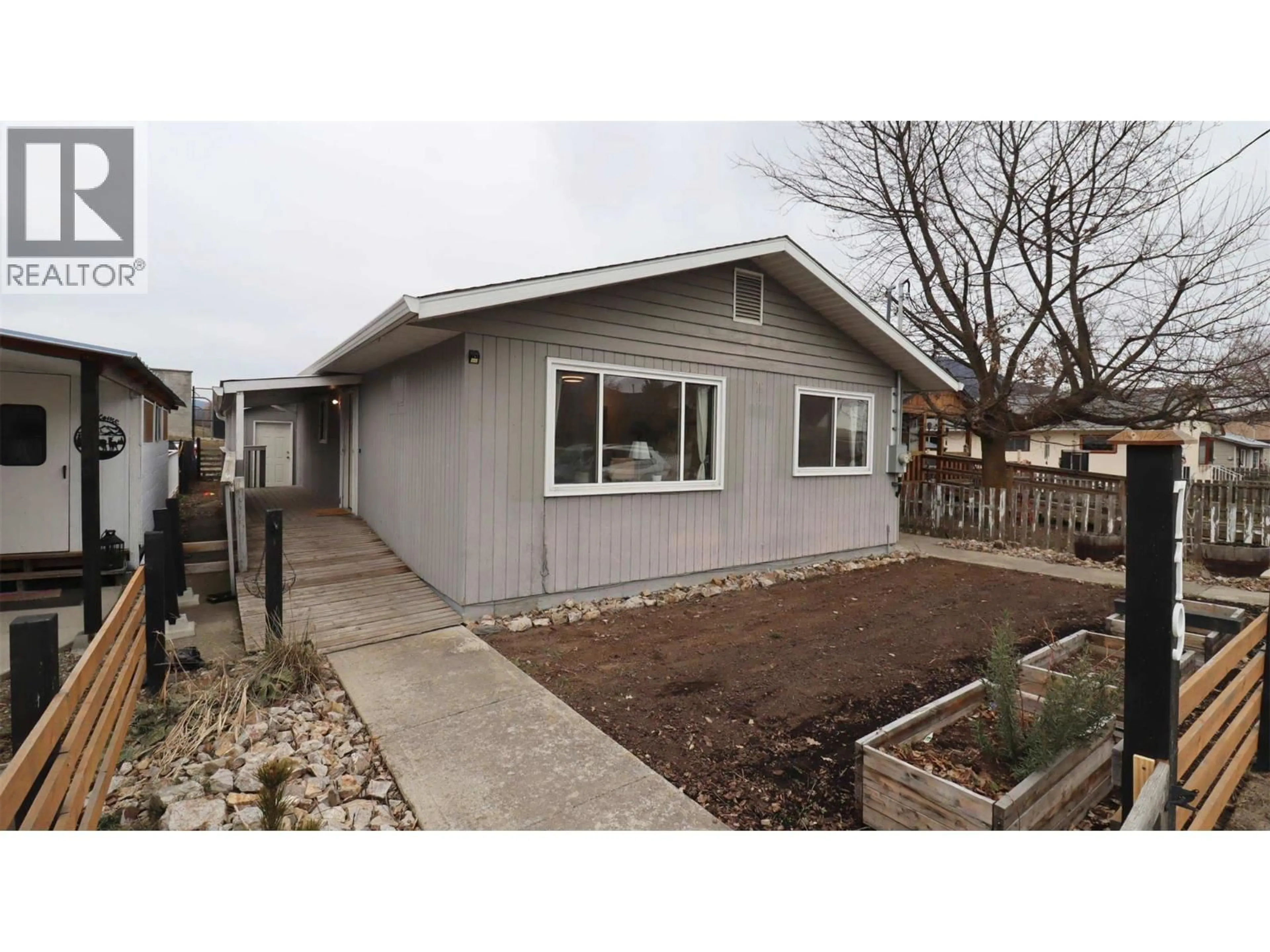 Home with vinyl exterior material, street for 719 KNIGHT AVENUE, Enderby British Columbia V0E1V1