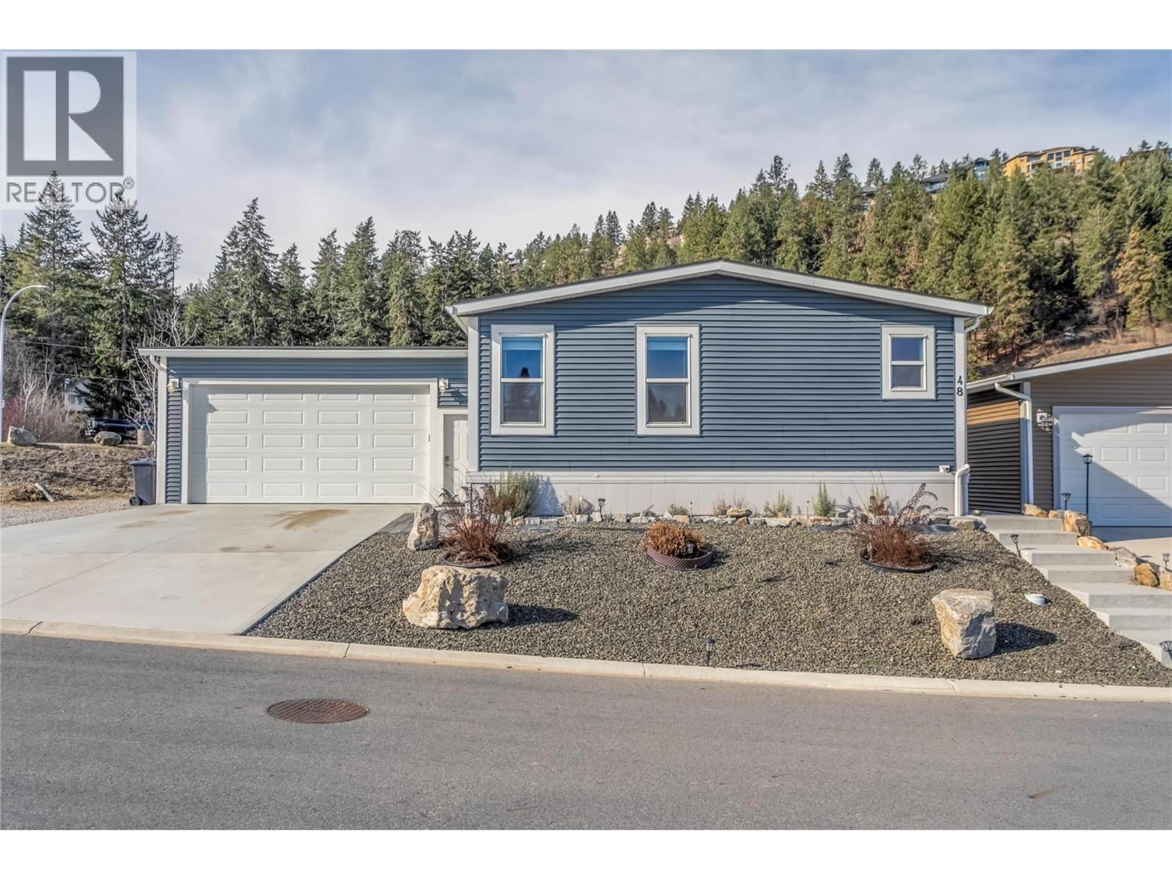 Home with vinyl exterior material, street for 48 - 1835 NANCEE WAY COURT, Kelowna British Columbia V1Z4C1