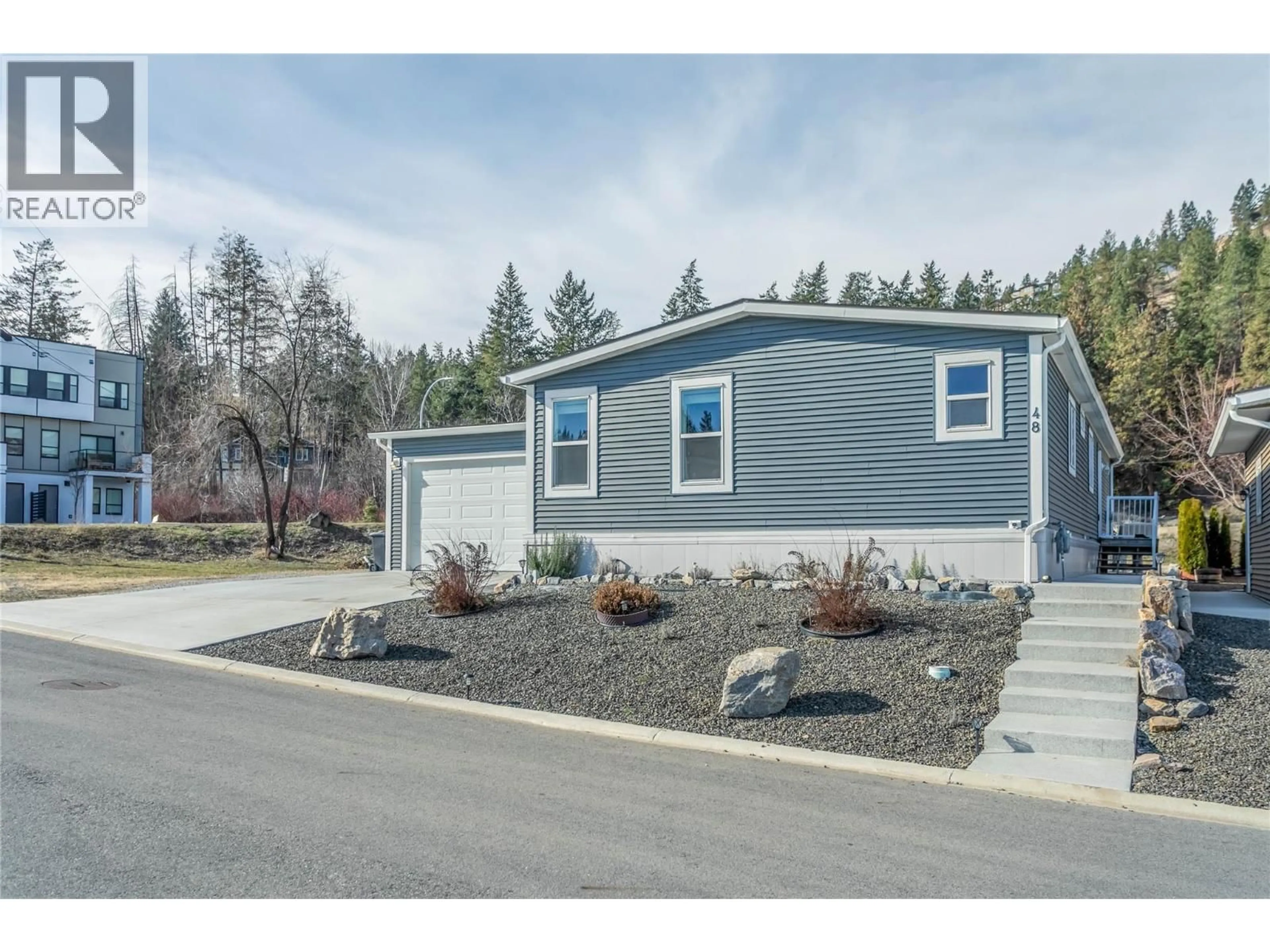 Home with vinyl exterior material, street for 48 - 1835 NANCEE WAY COURT, Kelowna British Columbia V1Z4C1