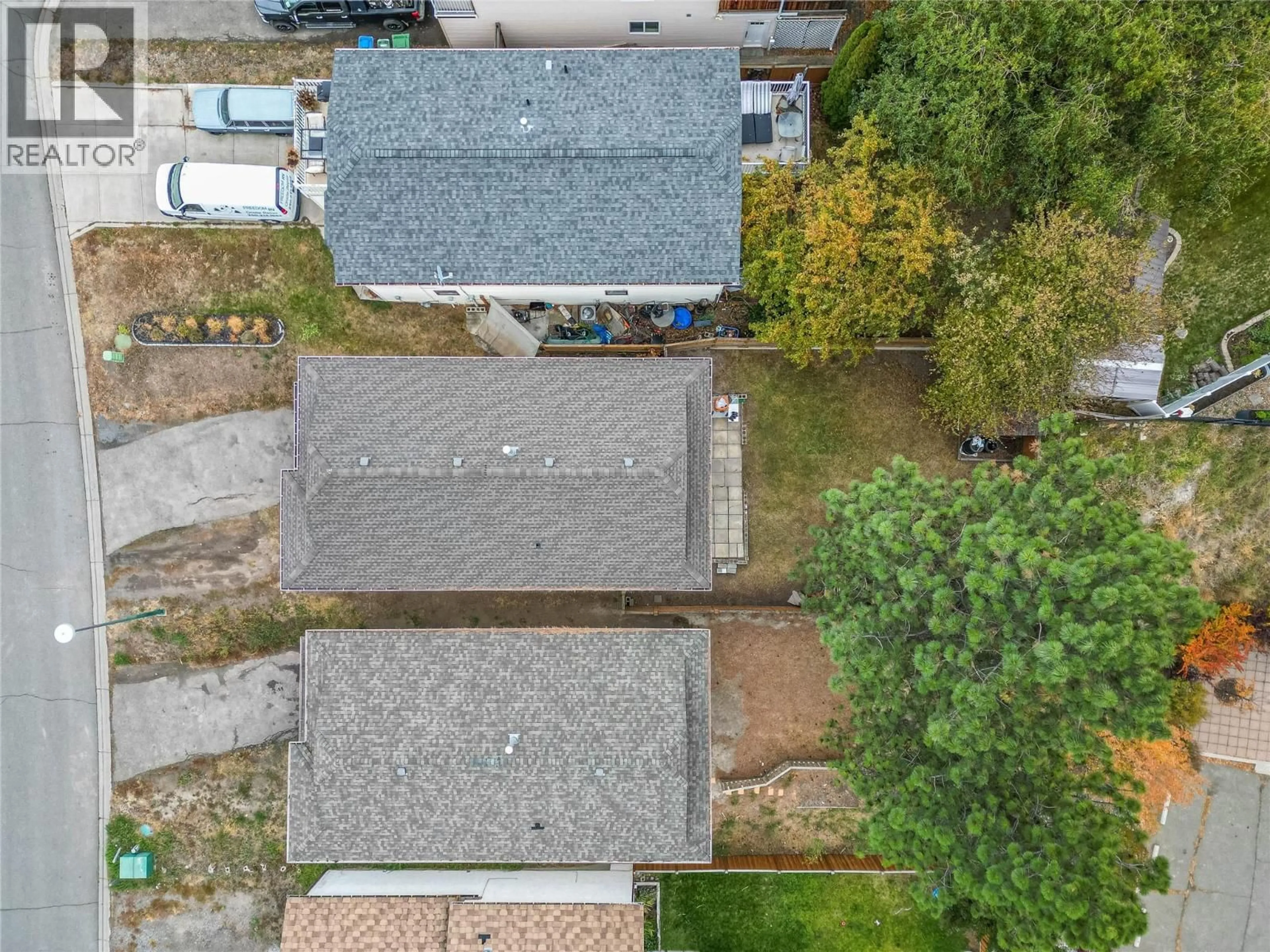 A pic from outside/outdoor area/front of a property/back of a property/a pic from drone, street for 2051 GLADSTONE DRIVE, Kamloops British Columbia V2E2B9