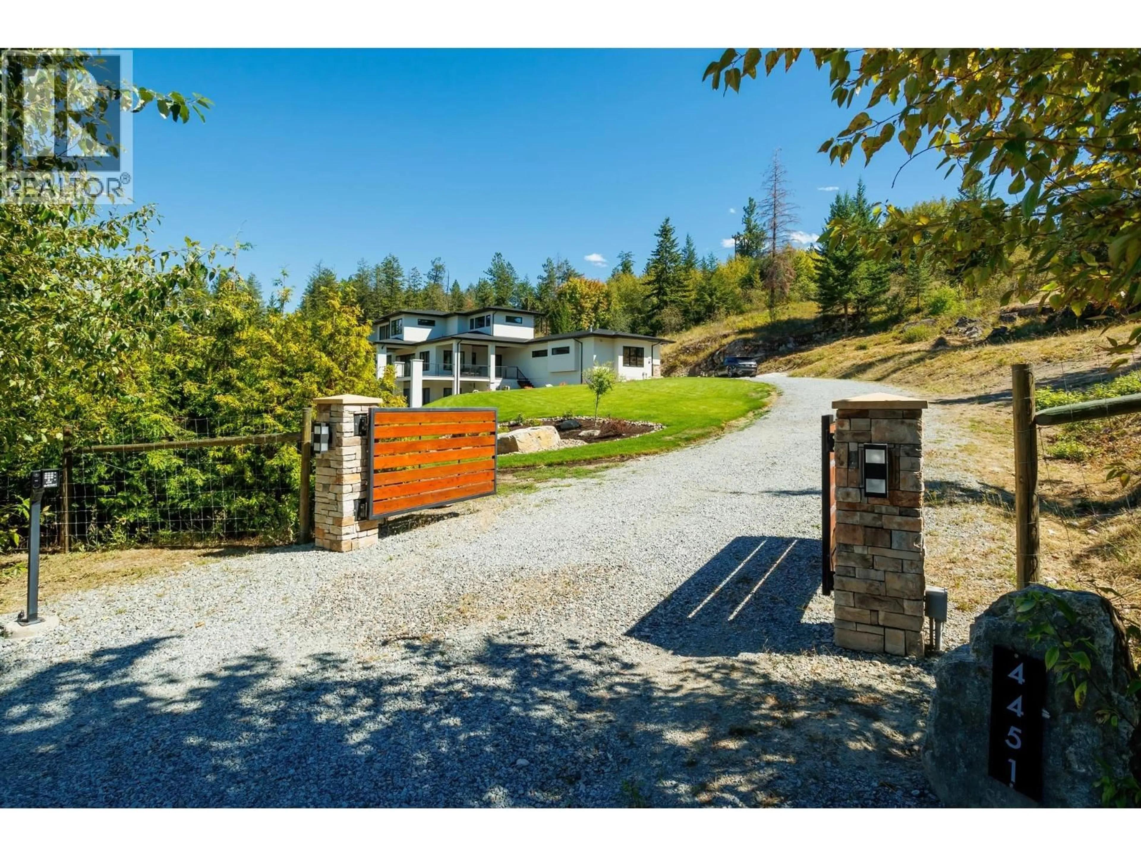 A pic from outside/outdoor area/front of a property/back of a property/a pic from drone, mountain view for 4451 HAYES ROAD, Kelowna British Columbia V1W5A7