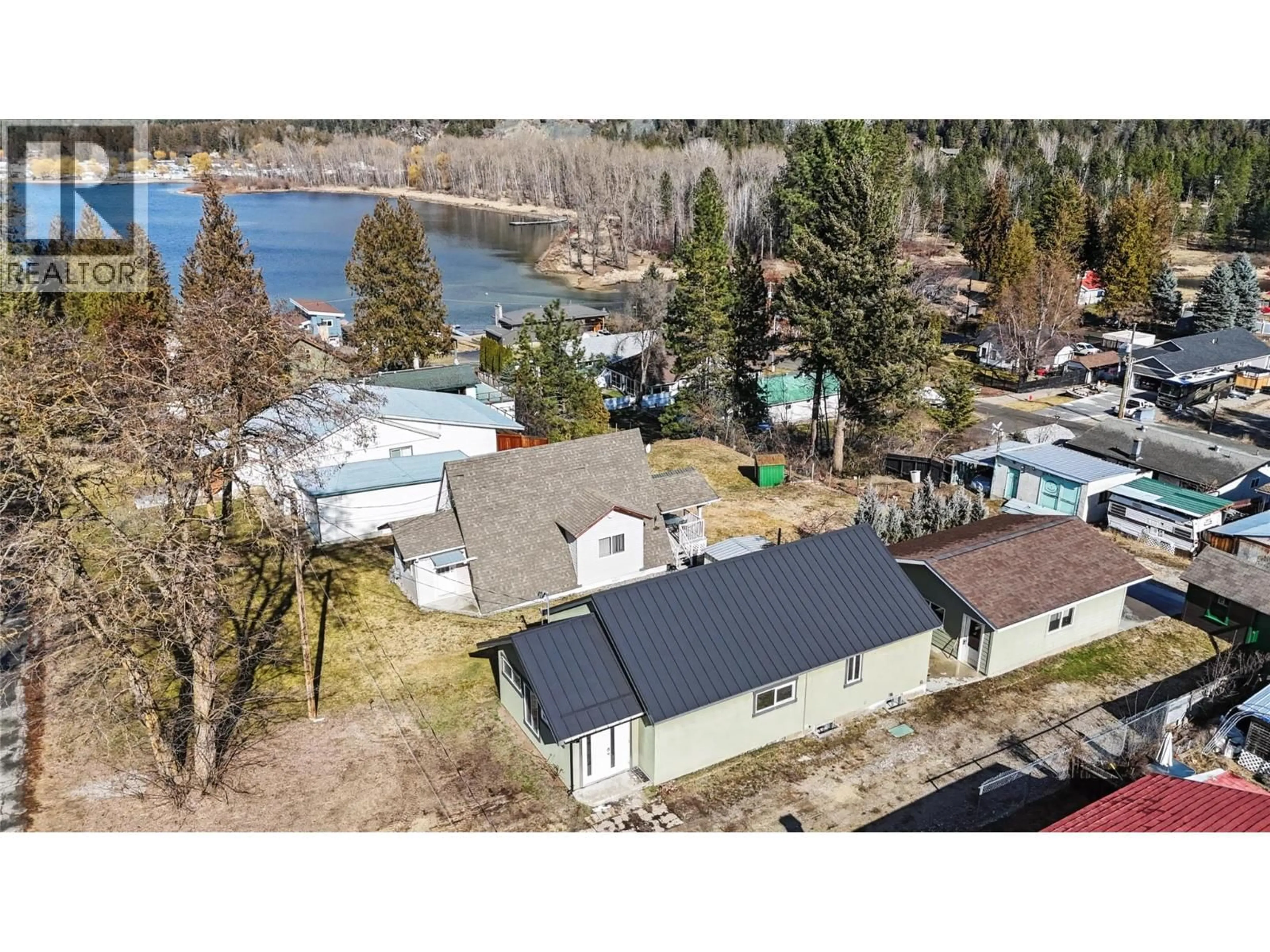 A pic from outside/outdoor area/front of a property/back of a property/a pic from drone, water/lake/river/ocean view for 1640 ODE ROAD, Christina Lake British Columbia V0H1E0