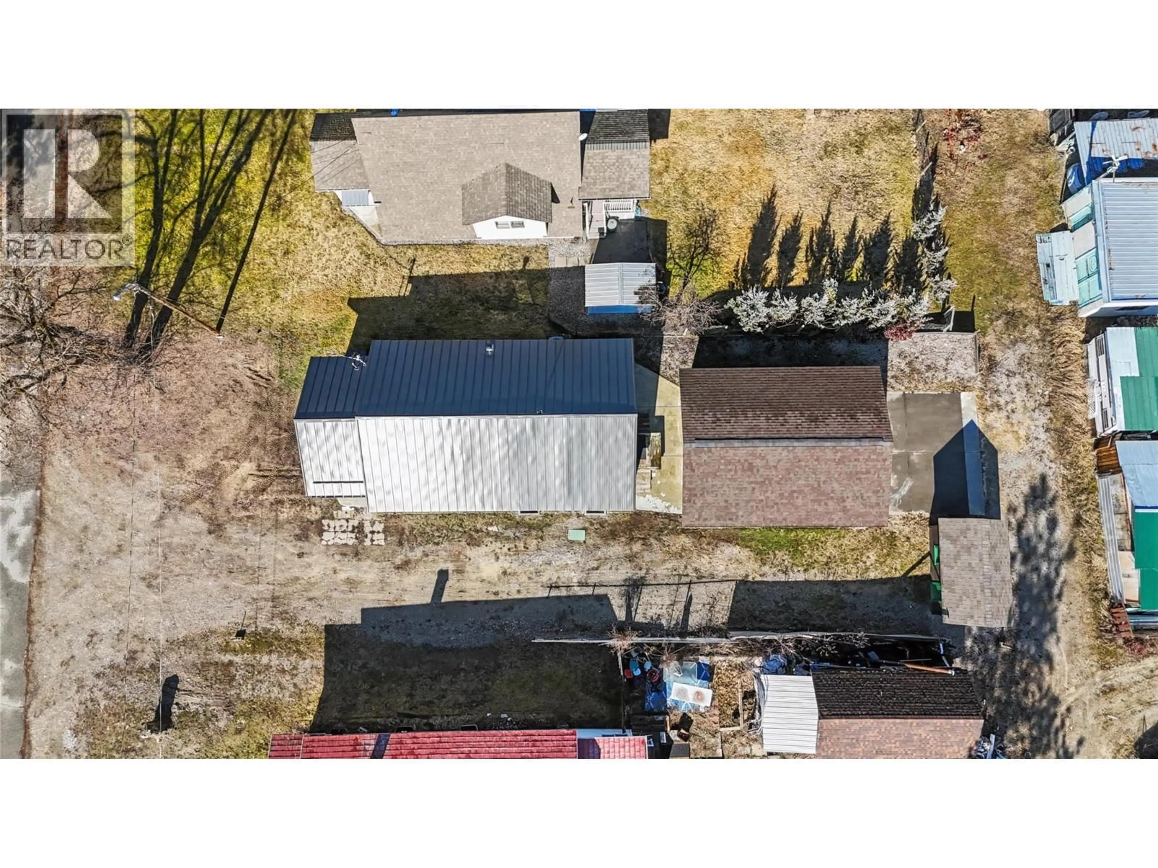 A pic from outside/outdoor area/front of a property/back of a property/a pic from drone, street for 1640 ODE ROAD, Christina Lake British Columbia V0H1E0