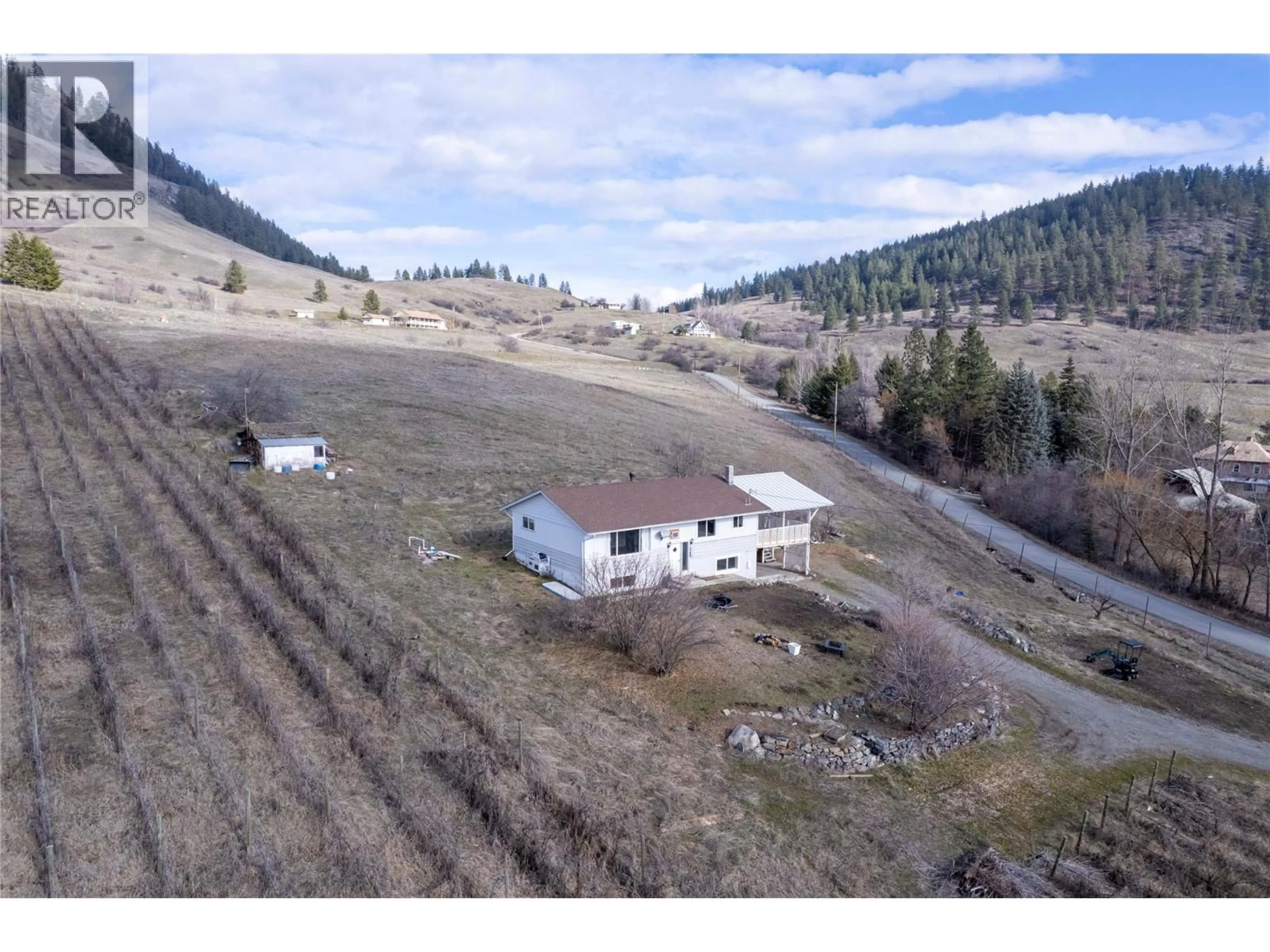 A pic from outside/outdoor area/front of a property/back of a property/a pic from drone, building for 6805 RESERVOIR ROAD, Grand Forks British Columbia V0H1H5