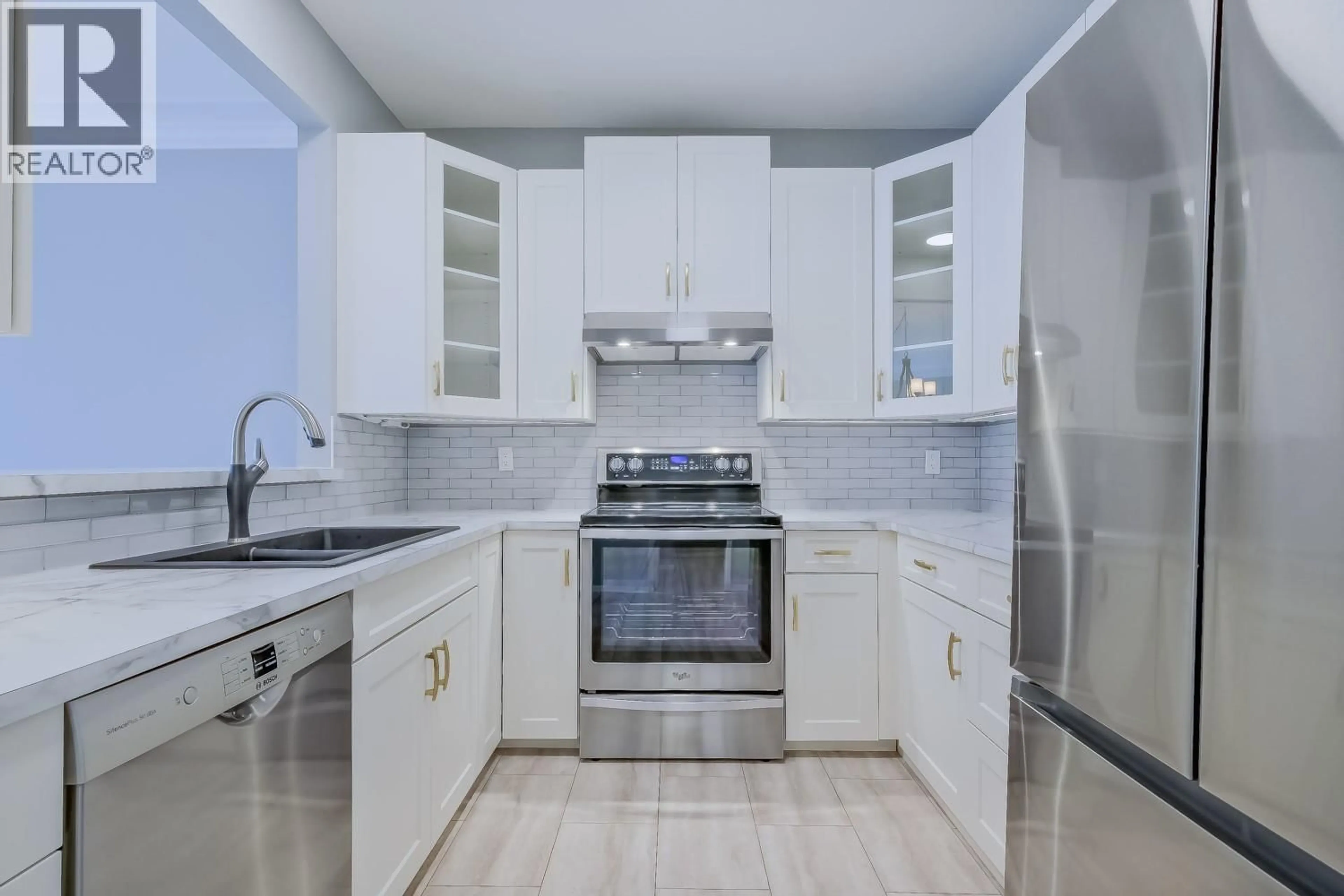 Standard kitchen, ceramic/tile floor for 225 - 877 KLO ROAD, Kelowna British Columbia V1Y9R1