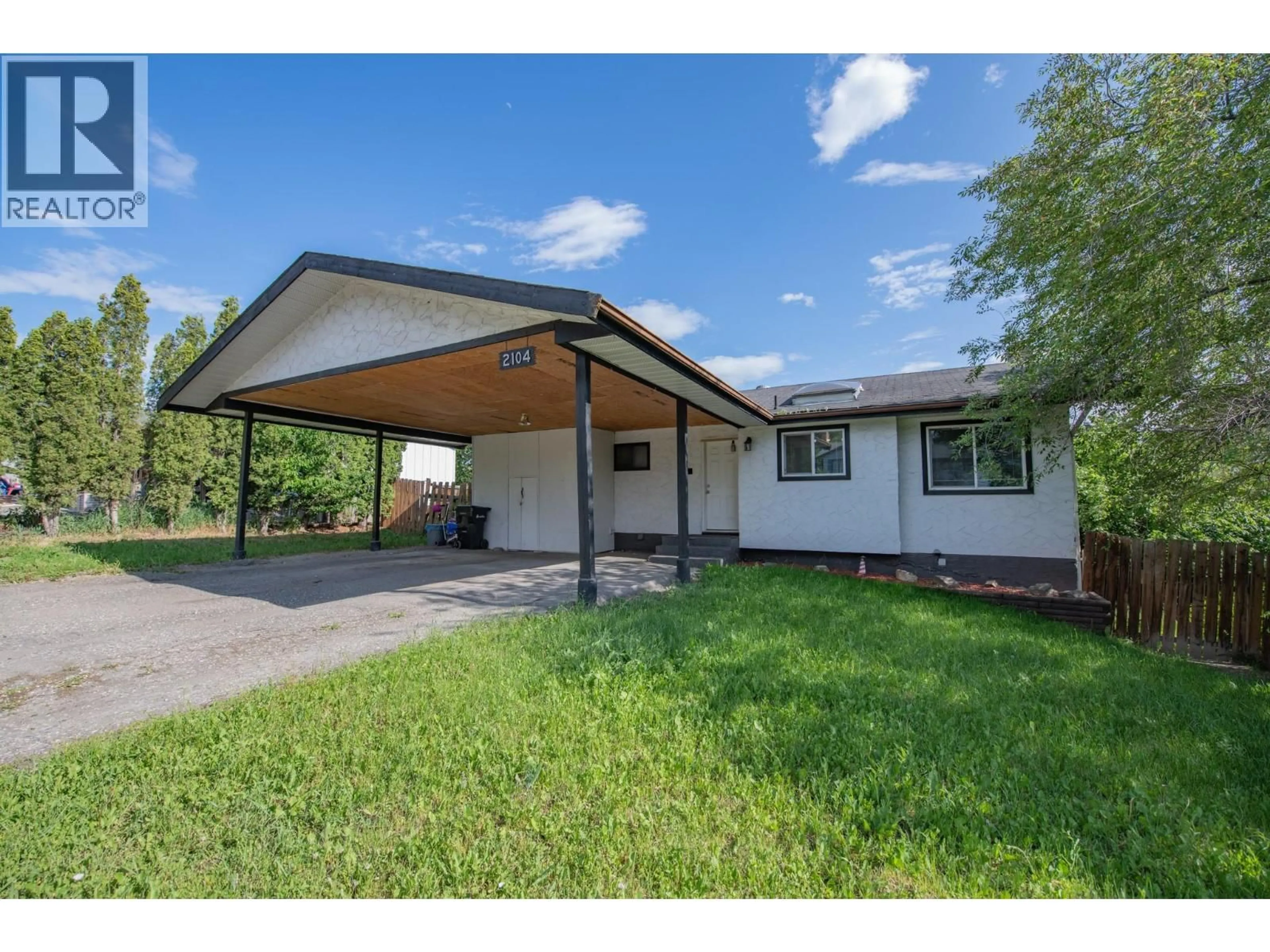 A pic from outside/outdoor area/front of a property/back of a property/a pic from drone, street for 2104 20 AVENUE, Vernon British Columbia V1T7J6