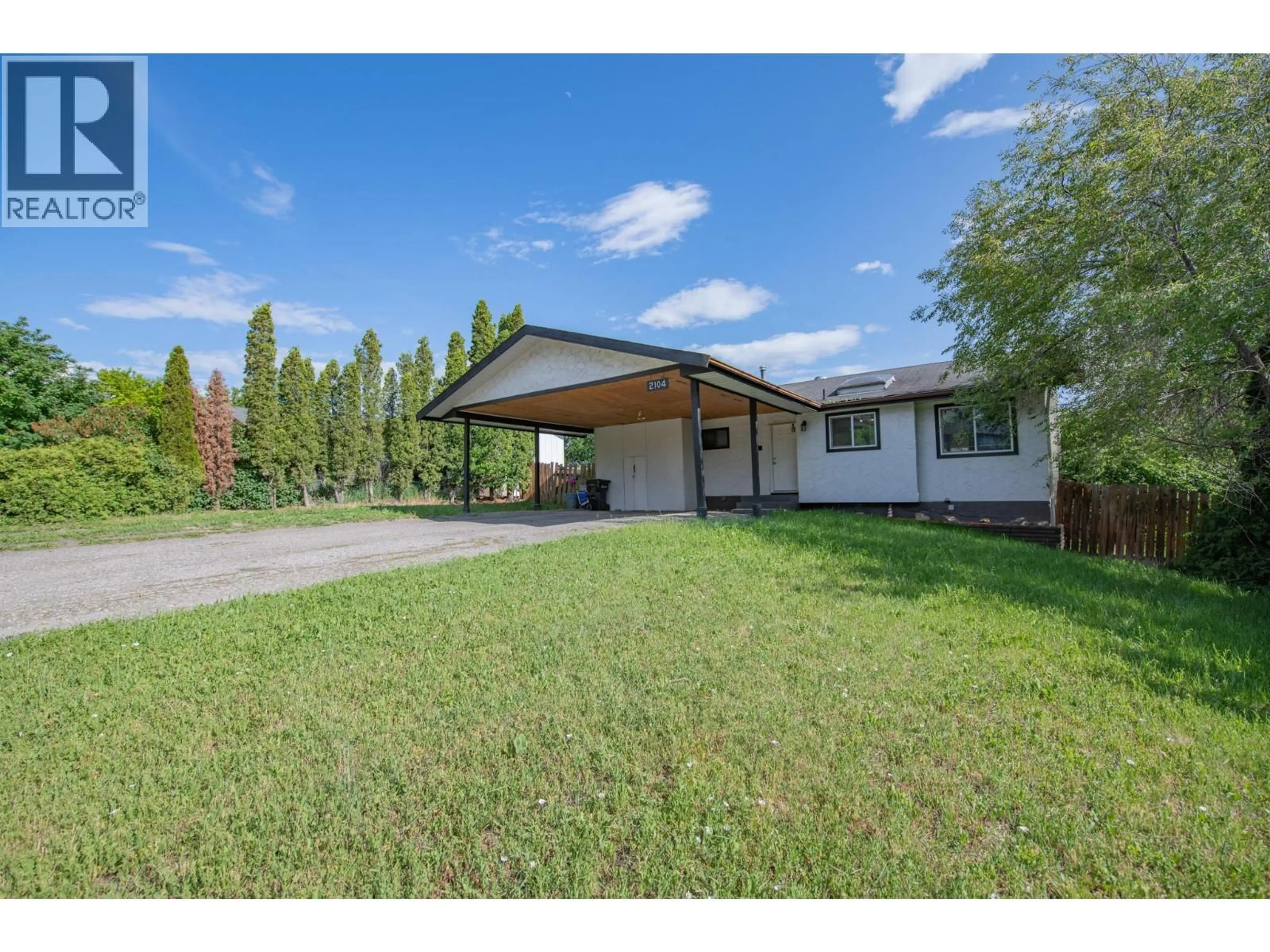 A pic from outside/outdoor area/front of a property/back of a property/a pic from drone, street for 2104 20 AVENUE, Vernon British Columbia V1T7J6